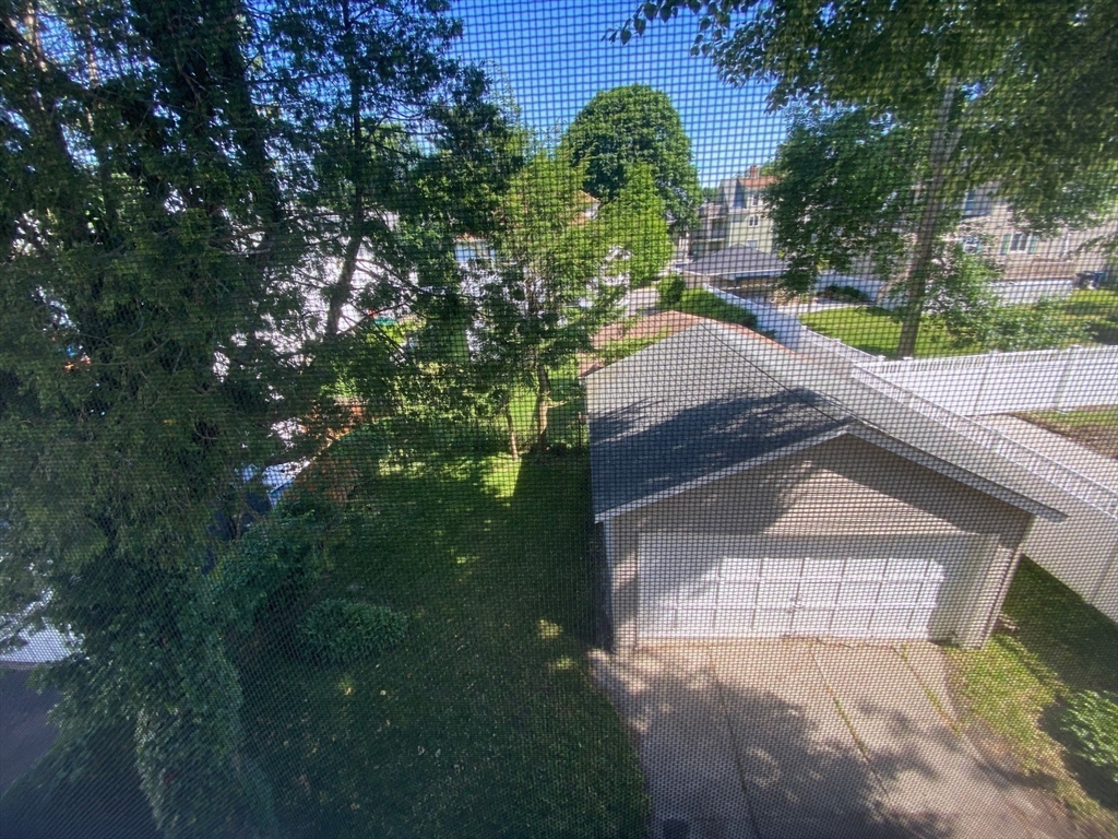 14 Welton Road Boston, MA 02132 - Photo 29 of 31 a view of a yard in front of the house