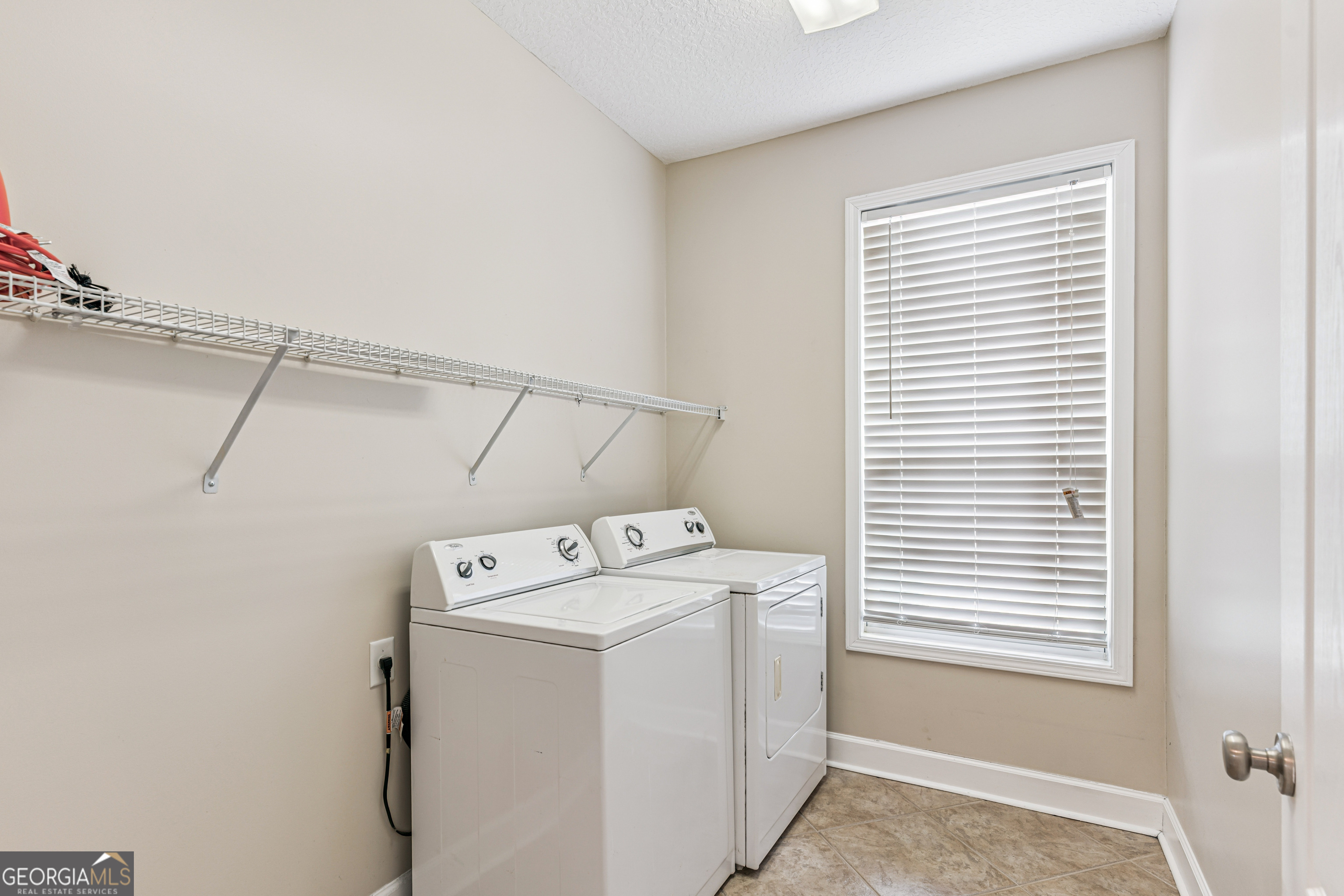 103 Meridian Drive Kingsland, GA 31548 - Photo 22 of 28 a utility room with dryer and washer