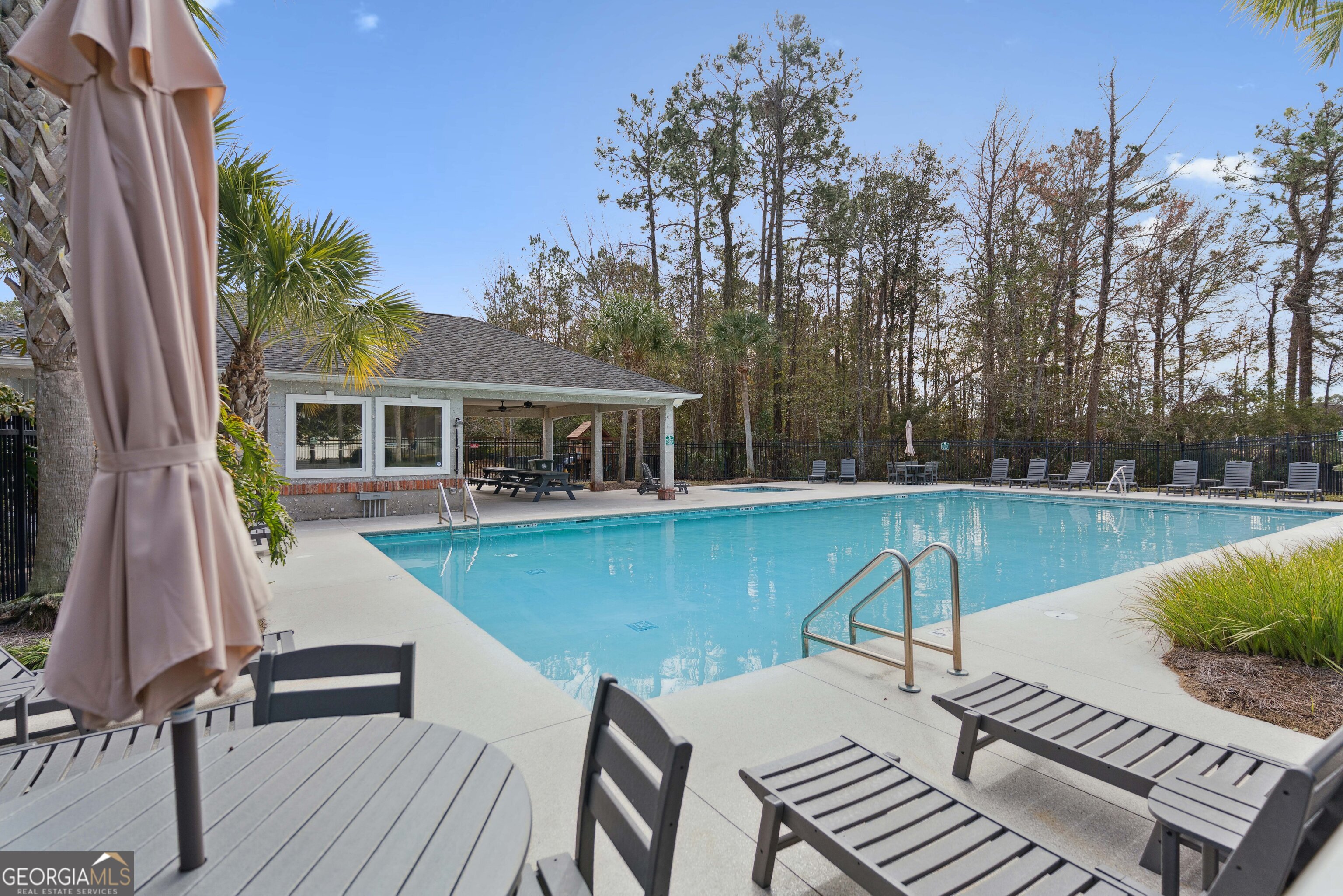 103 Meridian Drive Kingsland, GA 31548 - Photo 25 of 28 a view of a house with pool and a yard