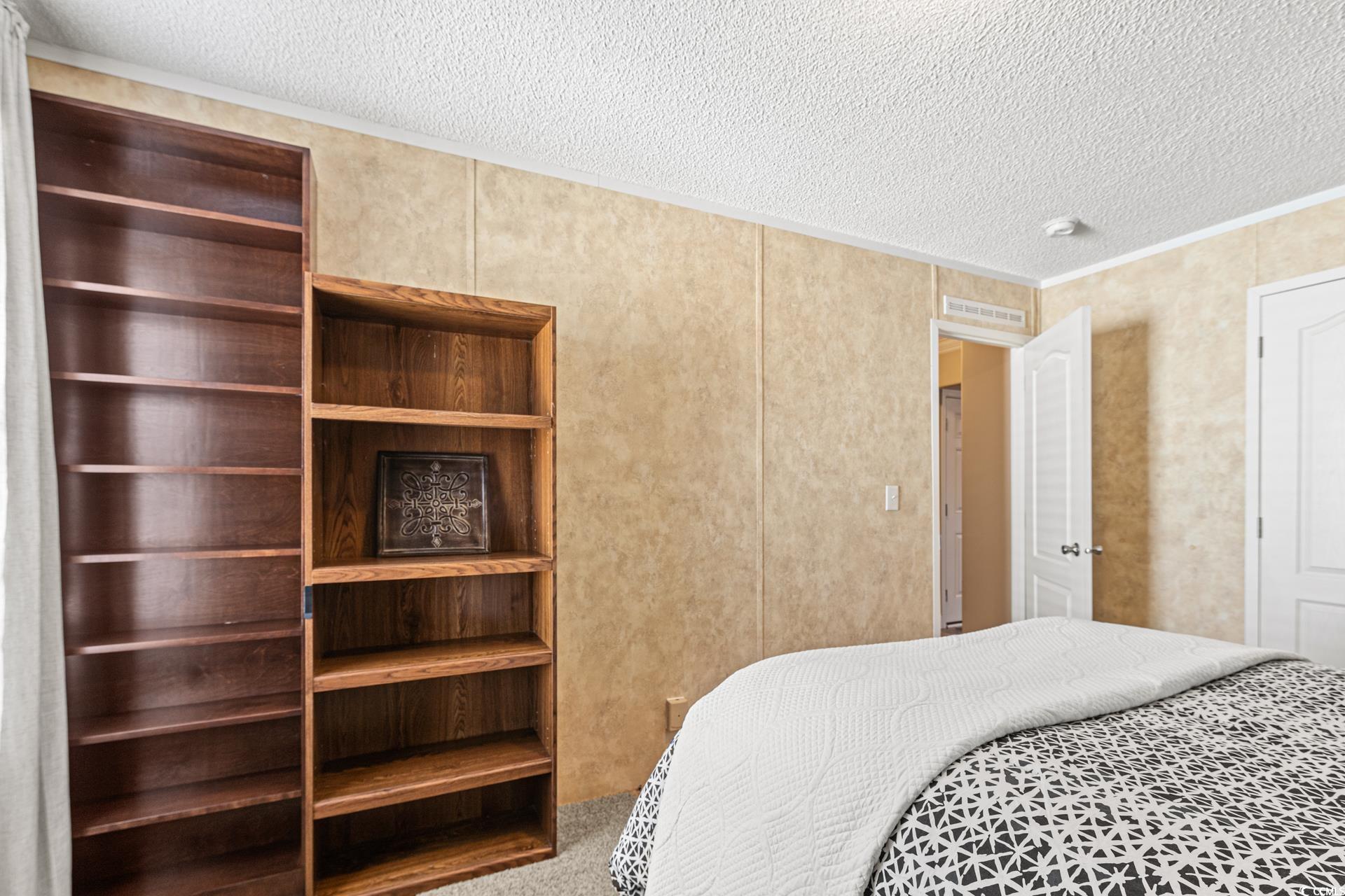 5148 Carriage Road Conway, SC 29527 - Photo 18 of 25 Bedroom featuring carpet flooring, ornamental mold