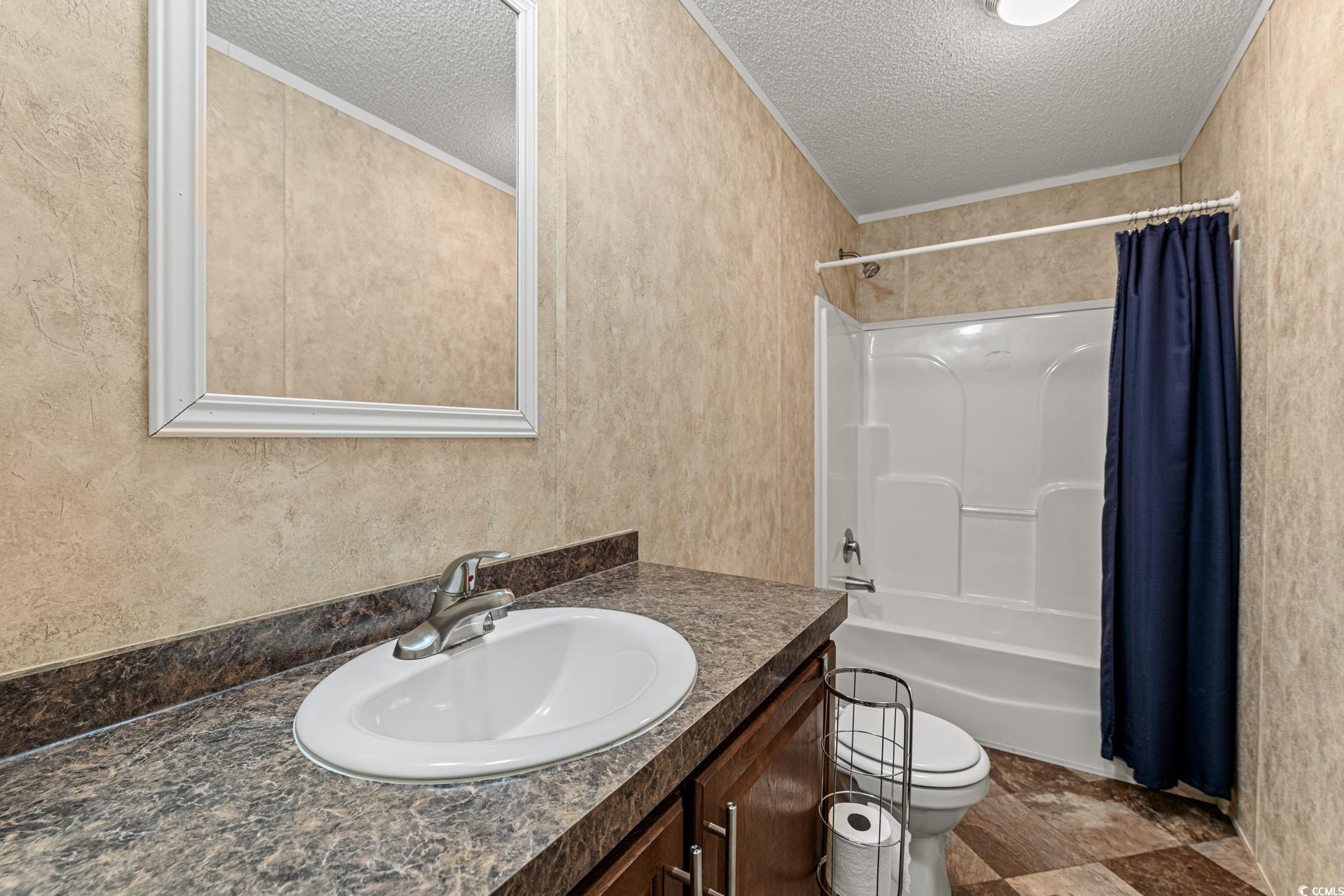 5148 Carriage Road Conway, SC 29527 - Photo 19 of 25 Full bathroom featuring vanity, shower / bath comb