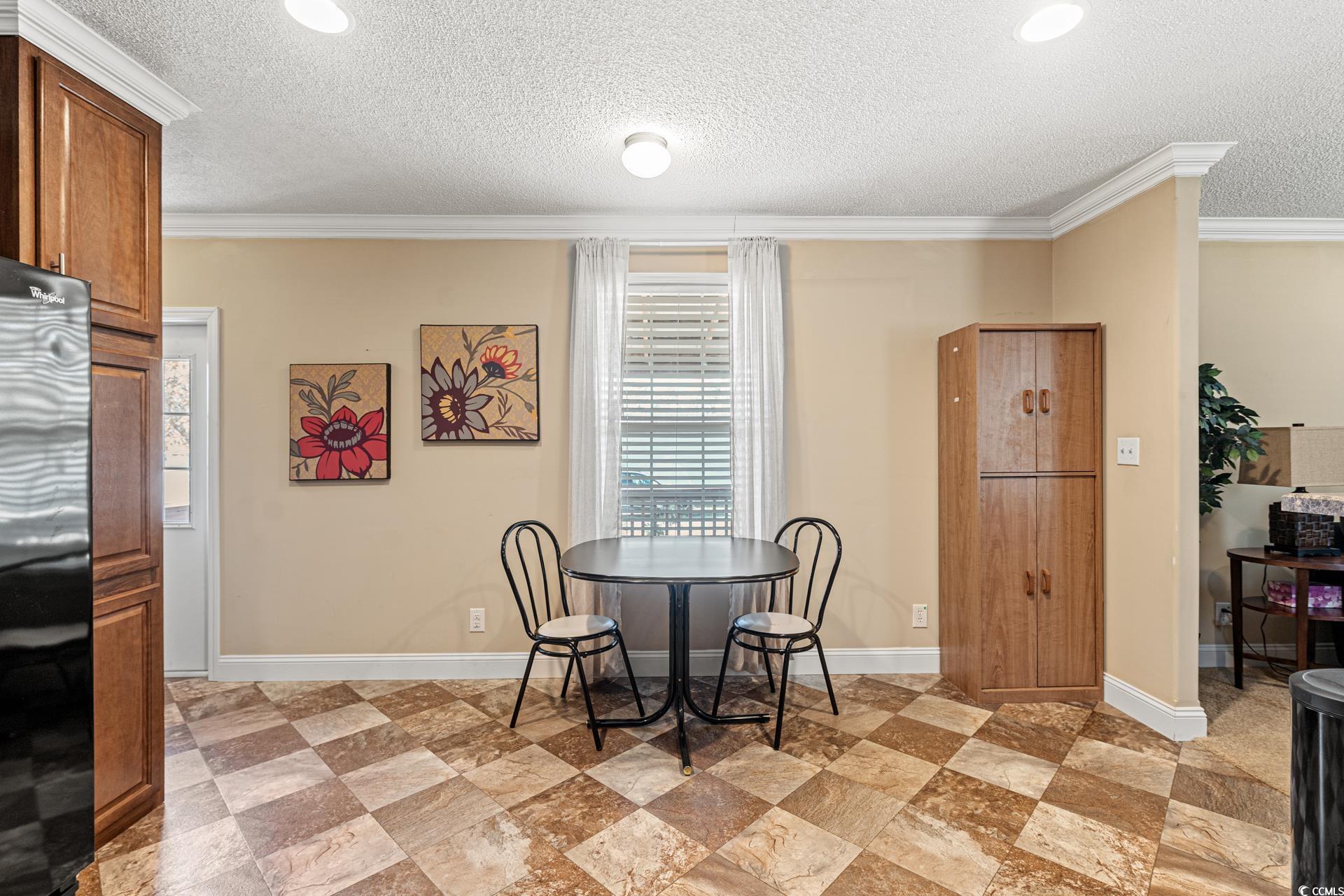 5148 Carriage Road Conway, SC 29527 - Photo 8 of 25 Dining space featuring a textured ceiling and orna