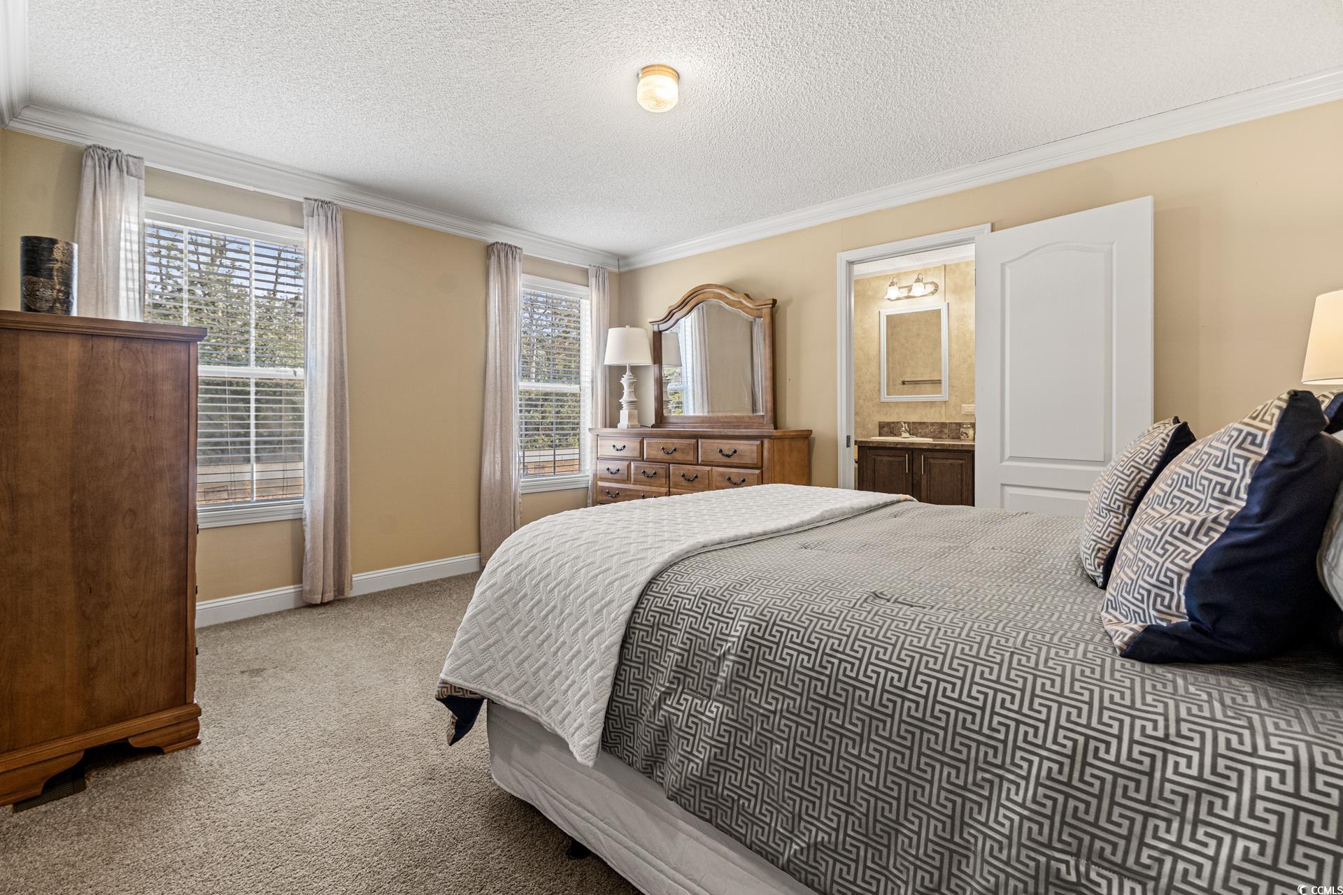 5148 Carriage Road Conway, SC 29527 - Photo 9 of 25 Carpeted bedroom with a textured ceiling, ensuite