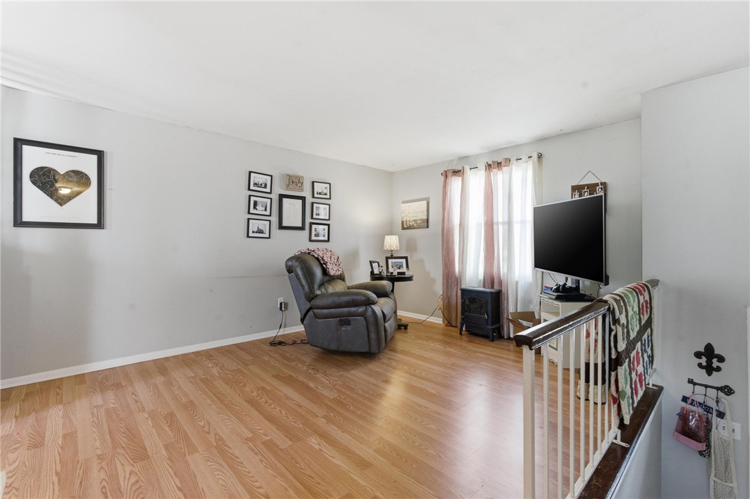 707 West Martindale Road Union, OH 45322 - Photo 2 of 28 This inviting living space features gleaming hardwood floors, creating a warm and welcoming atmosphere.