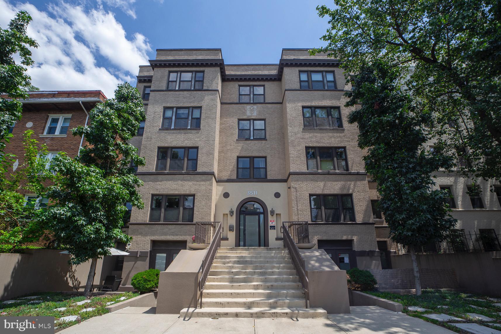 3511 13th Street Northwest, Unit 102 Washington, DC 20010 - Photo 12 of 23 a front view of a multi story building with yard