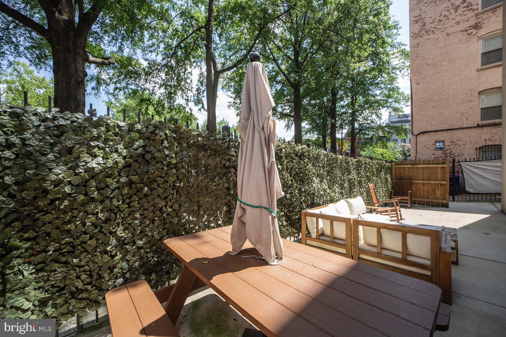 3511 13th Street Northwest, Unit 102 Washington, DC 20010 - Photo 14 of 23 front view of a house with a yard