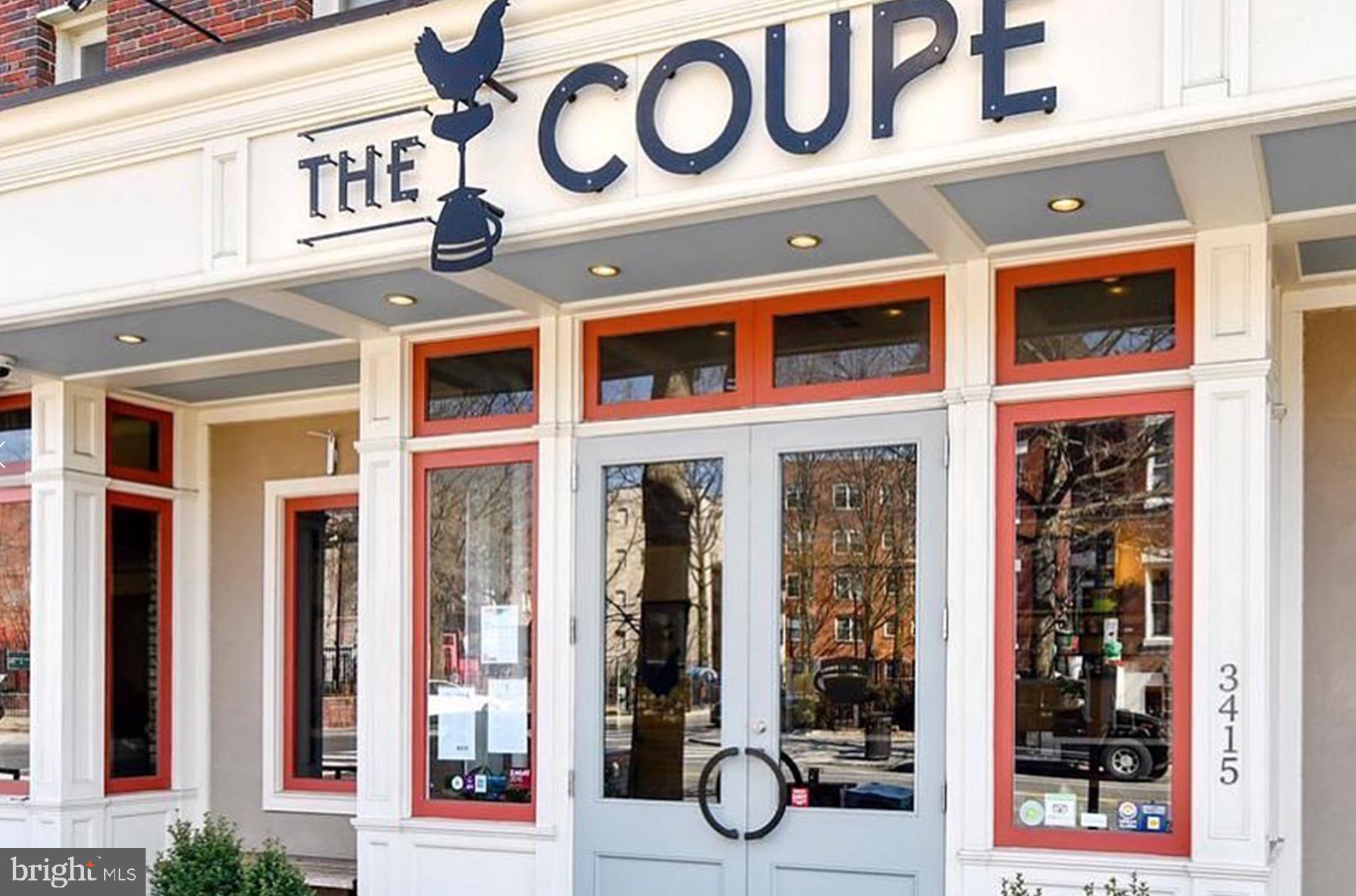 3511 13th Street Northwest, Unit 102 Washington, DC 20010 - Photo 22 of 23 a view of a building with a glass door