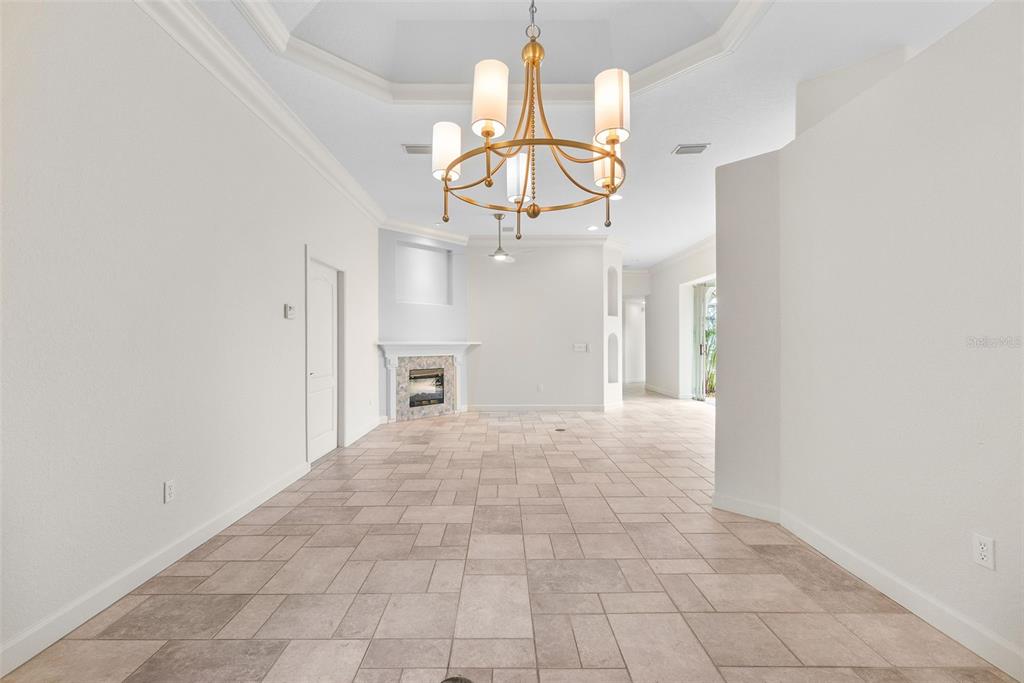 8356 Mareva Lane Sarasota, FL 34241 - Photo 14 of 44 a view of entryway and hall with a chandelier fan