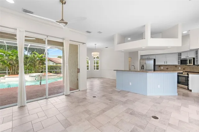 a view of a house with a swimming pool