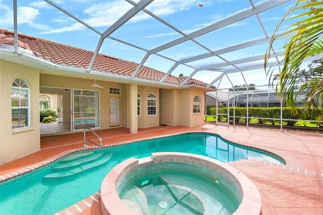 a swimming pool with yard barbeque oven and outdoor seating