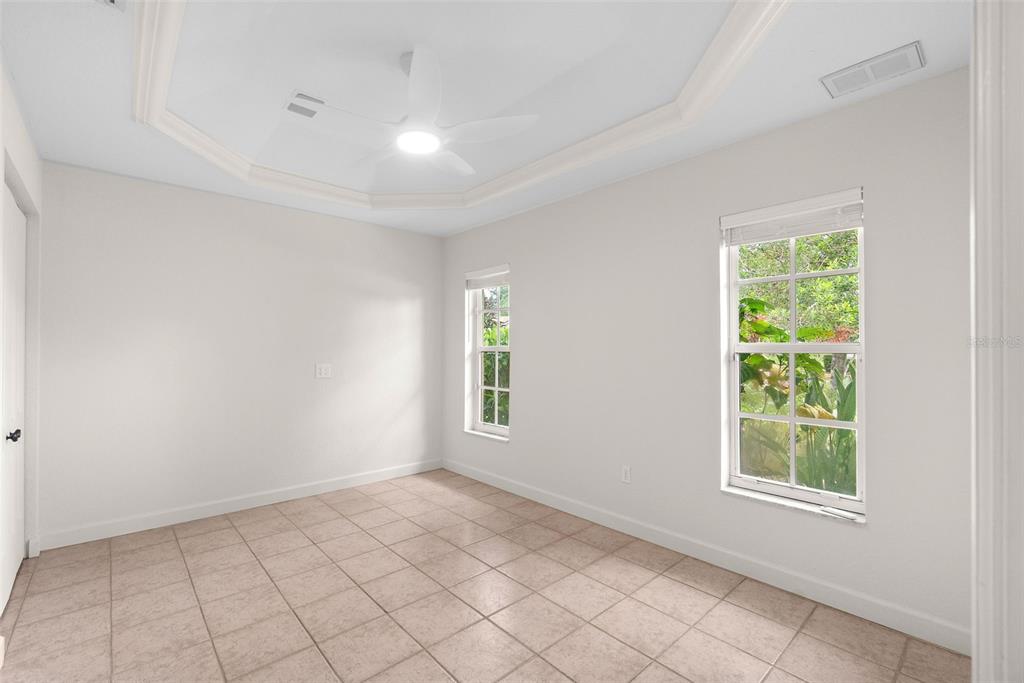 8356 Mareva Lane Sarasota, FL 34241 - Photo 32 of 44 an empty room with windows