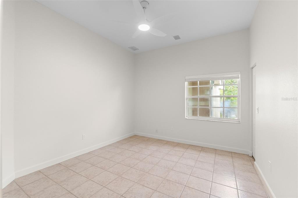 8356 Mareva Lane Sarasota, FL 34241 - Photo 35 of 44 an empty room with a empty space and windows