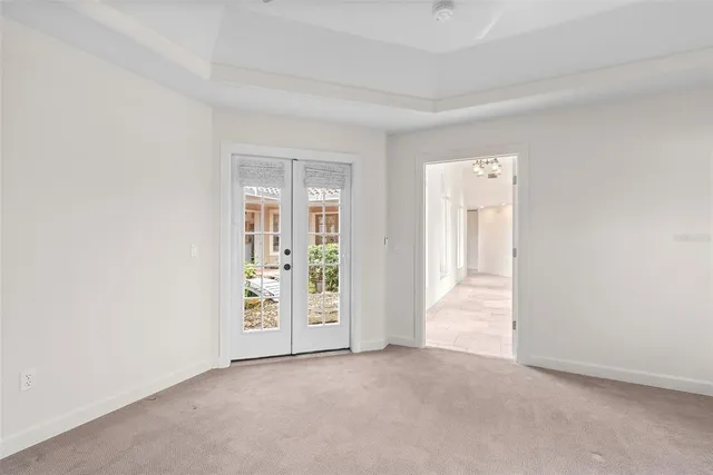 a view of a hallway with washer and dryer