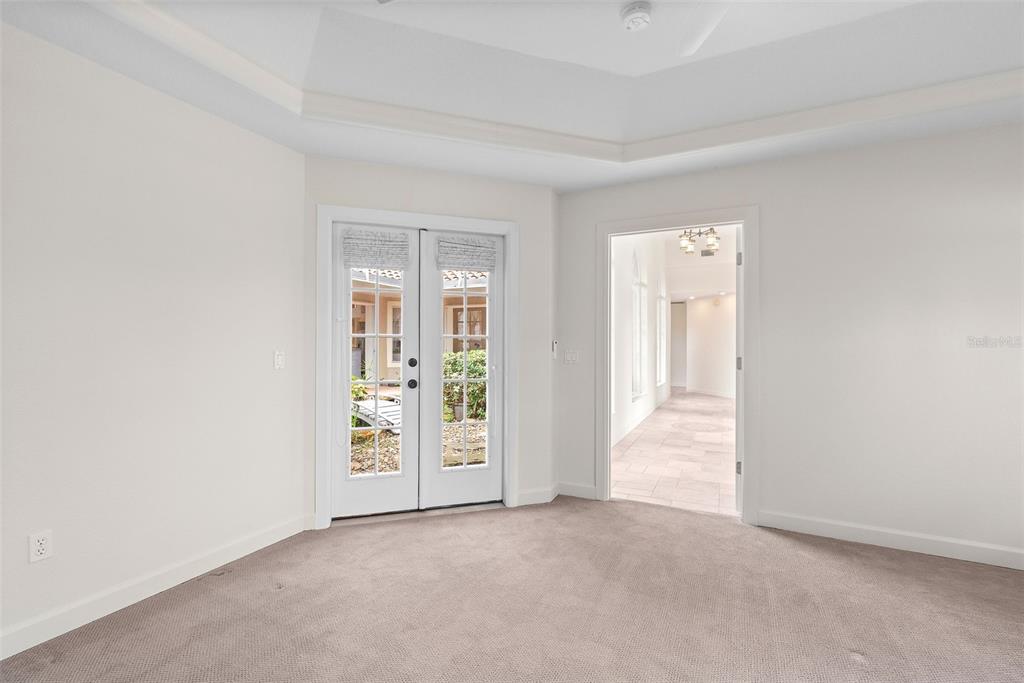 8356 Mareva Lane Sarasota, FL 34241 - Photo 37 of 44 an empty room with windows