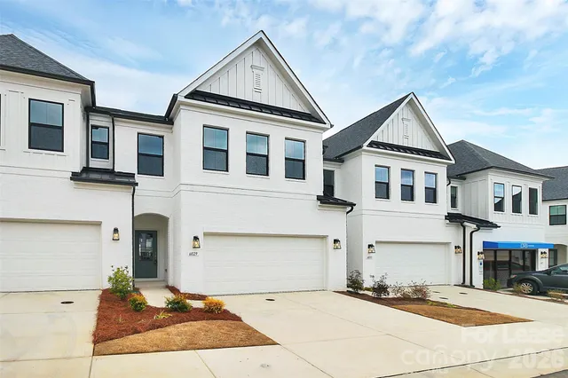 a front view of a house with yard