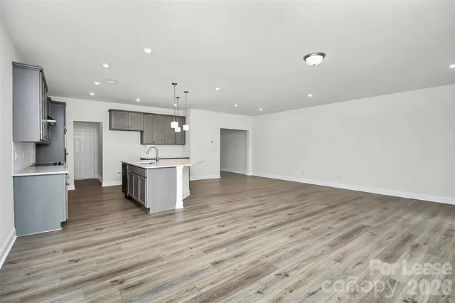 a view of kitchen with wooden floor