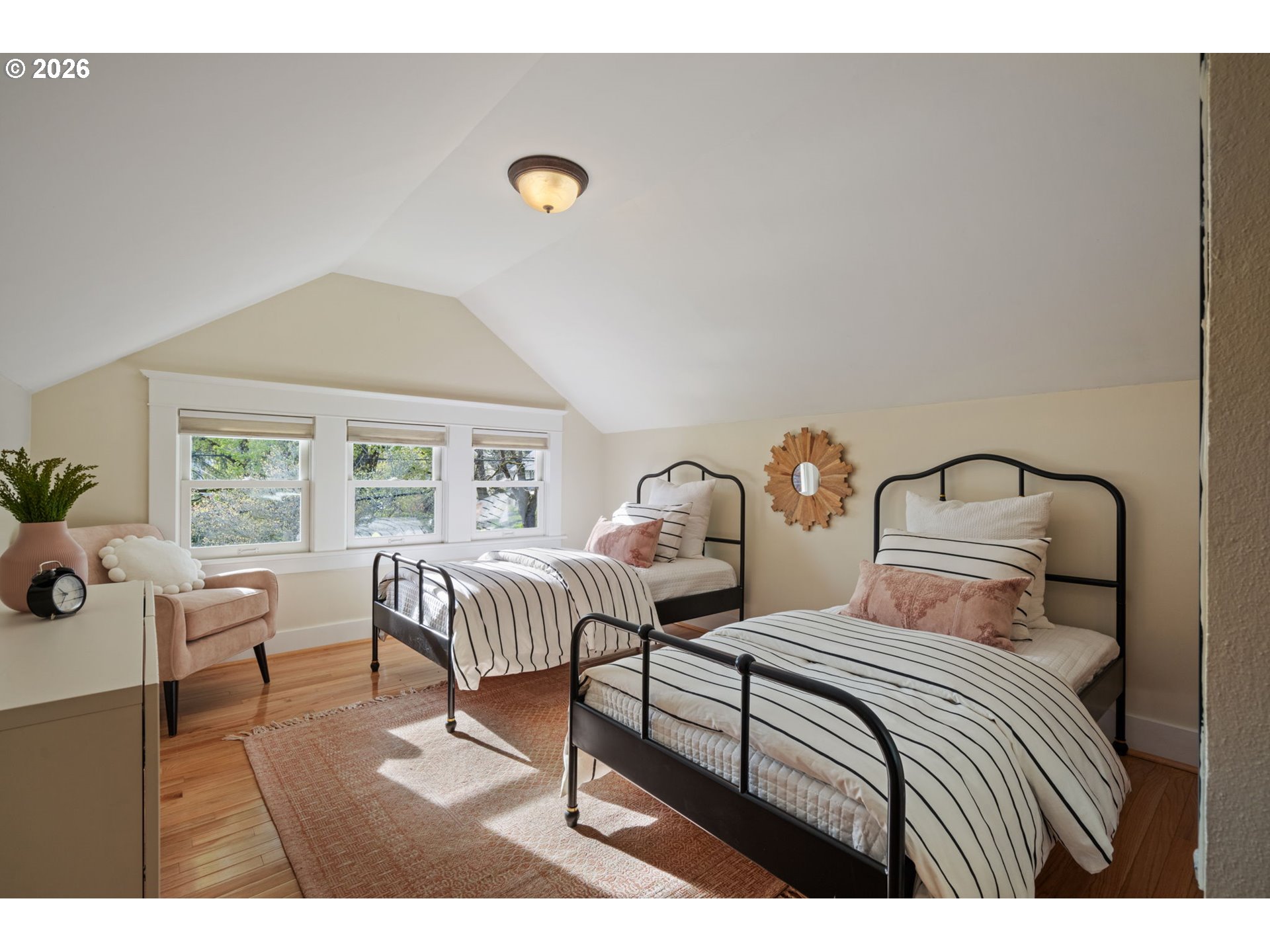 316 Northeast 44th Avenue Portland, OR 97213 - Photo 23 of 43 a bedroom with a bed and a couch