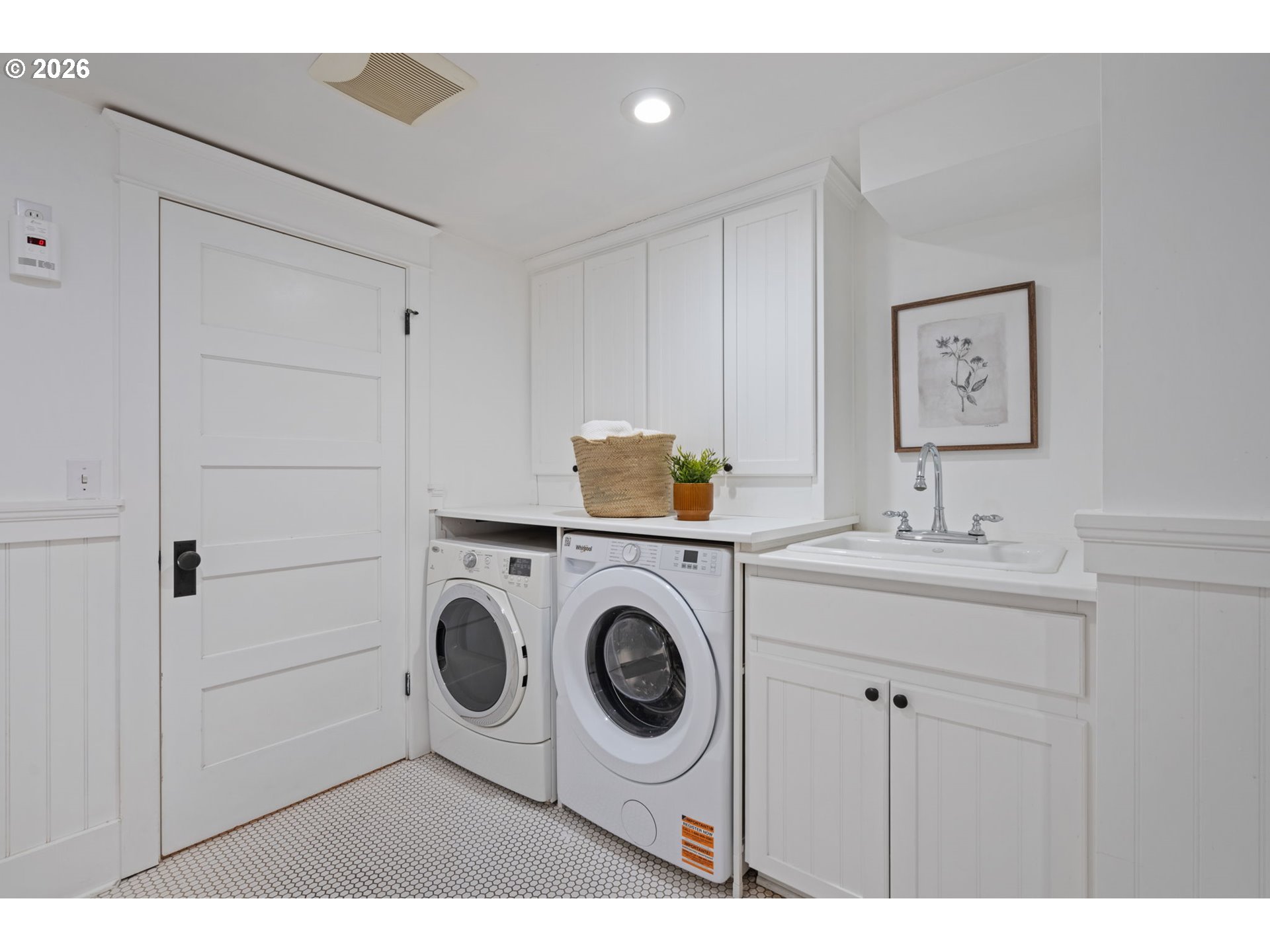 316 Northeast 44th Avenue Portland, OR 97213 - Photo 30 of 43 a bathroom with a sink and a washer dryer