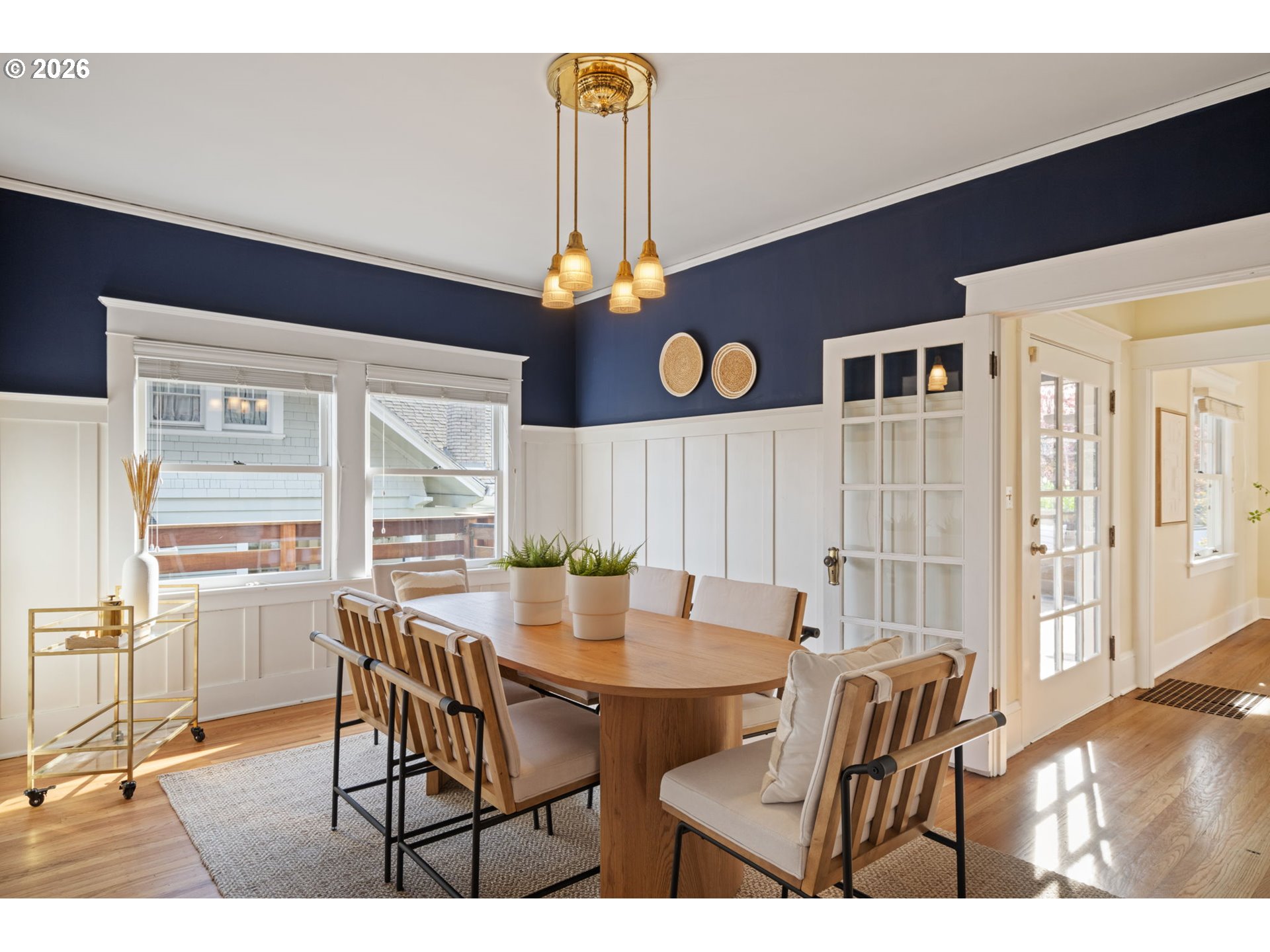 316 Northeast 44th Avenue Portland, OR 97213 - Photo 6 of 43 a view of a dining room with furniture and wooden floor