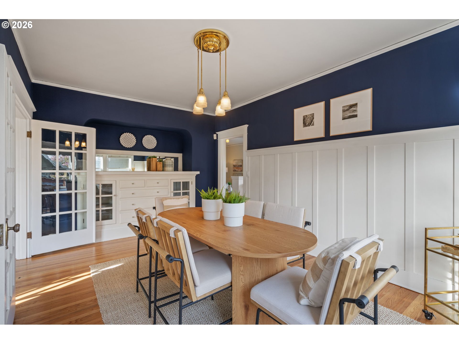 316 Northeast 44th Avenue Portland, OR 97213 - Photo 7 of 43 a view of a dining room with furniture and chandelier