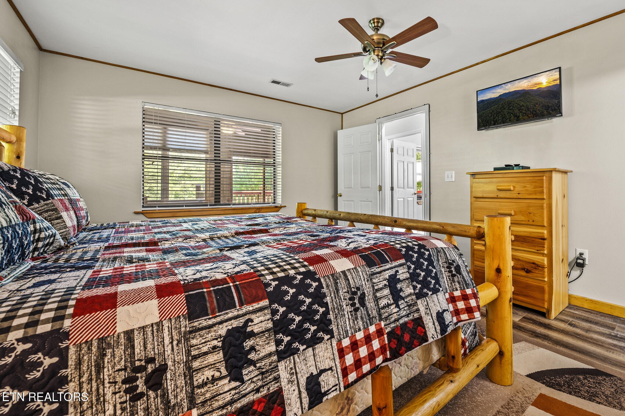 3503 Jakes Ridge Sevierville, TN 37862 - Photo 16 of 30 a bedroom with a bed and flat screen tv