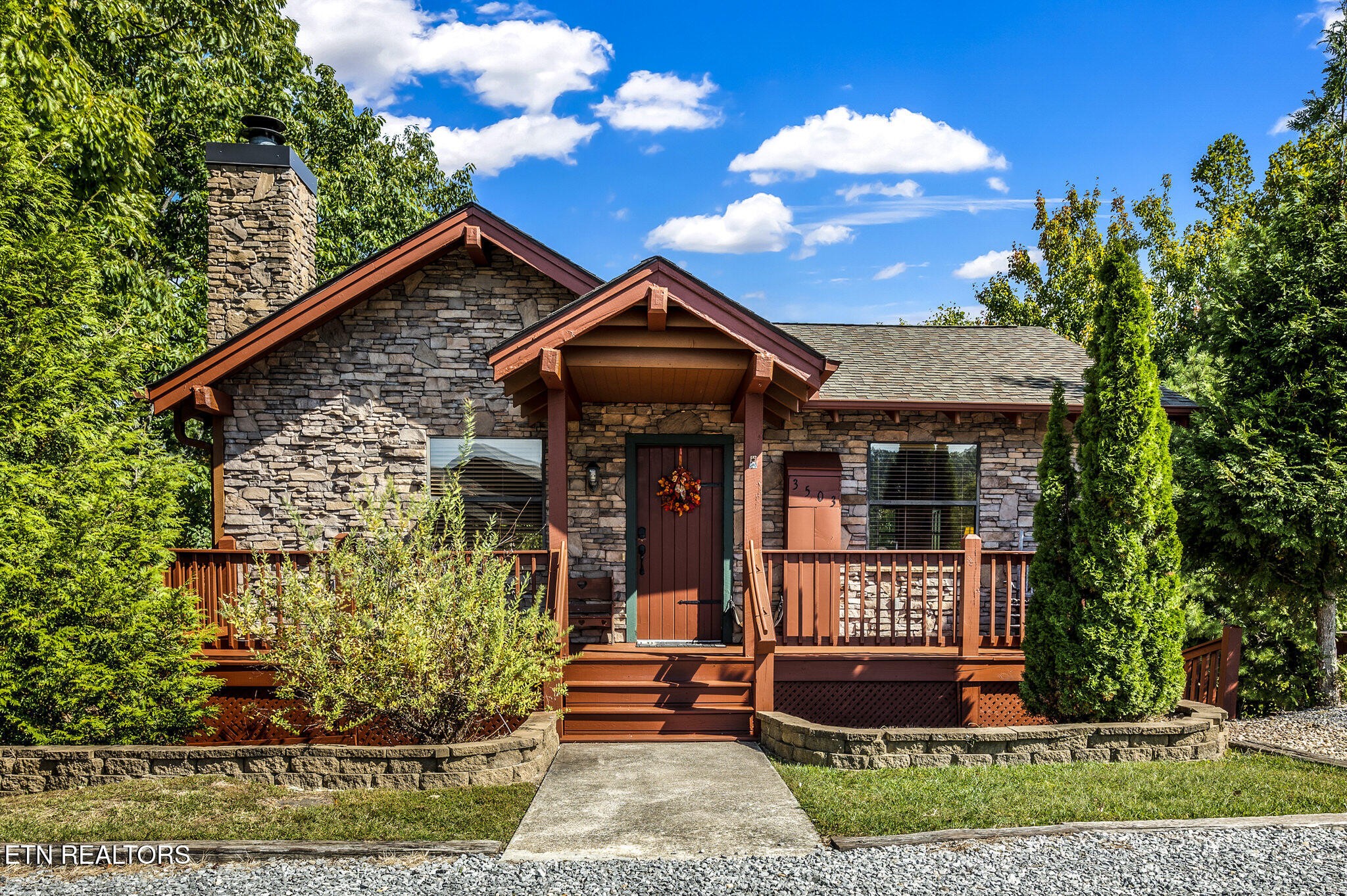 3503 Jakes Ridge Sevierville, TN 37862 - Photo 2 of 30 front view of a house with a yard