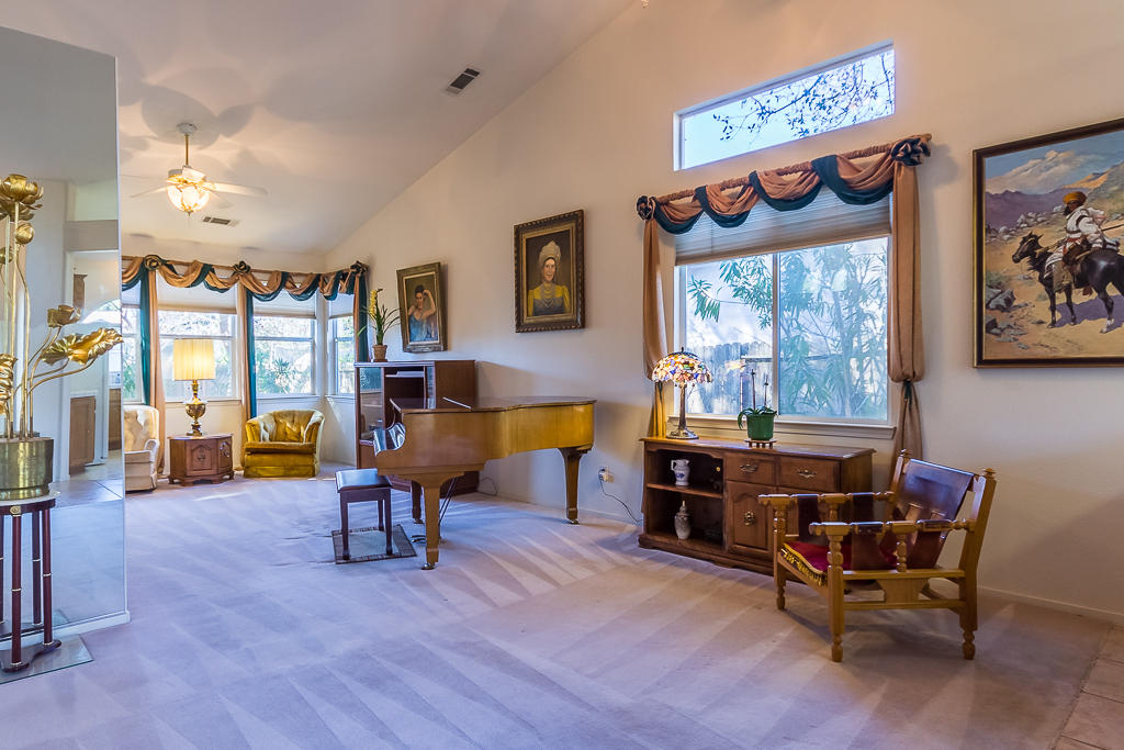 3318 Lawrence Road Redding, CA 96002 - Photo 3 of 24 a living room with furniture and a wooden floor