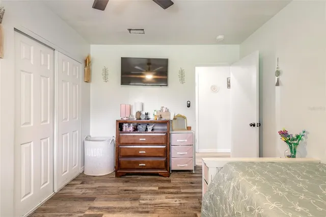a room with furniture and a flat screen tv