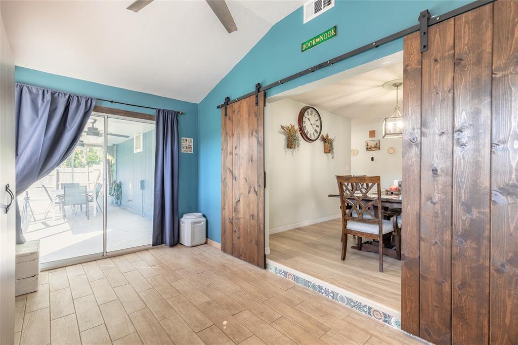 1804 Mango Tree Drive Edgewater, FL 32132 - Photo 24 of 43 a view of a hallway with a livingroom and dining room view