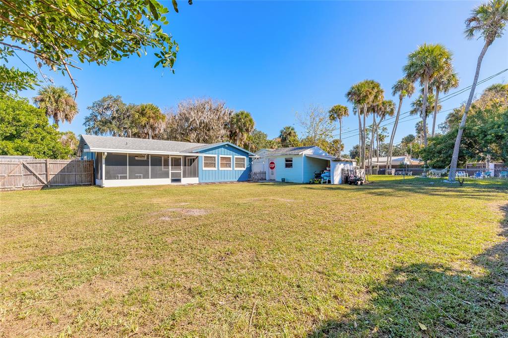 1804 Mango Tree Drive Edgewater, FL 32132 - Photo 28 of 43 a house view with swimming pool in front