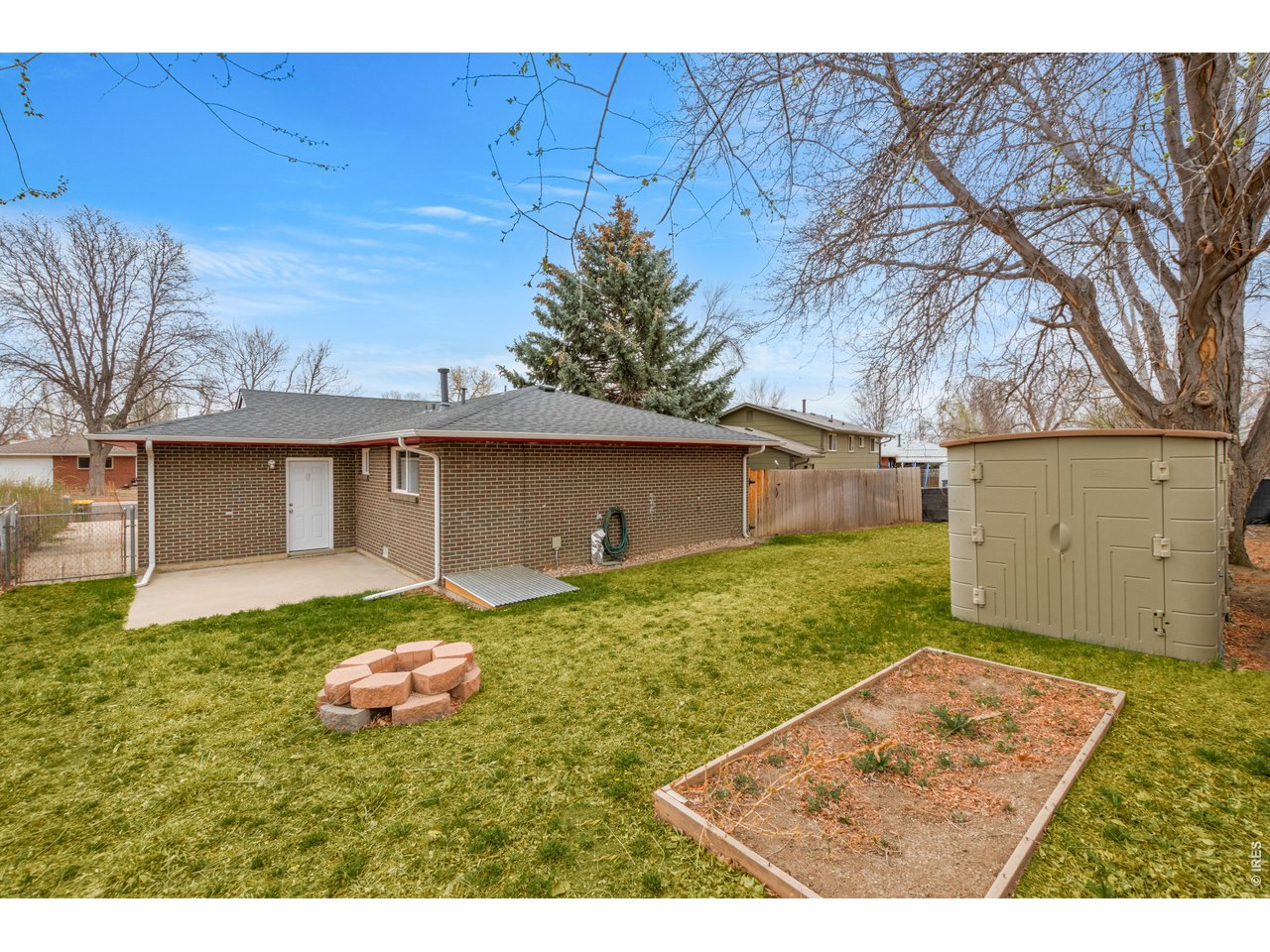 439 Dickson Street Longmont, CO 80504 - Photo 26 of 31 a backyard of a house