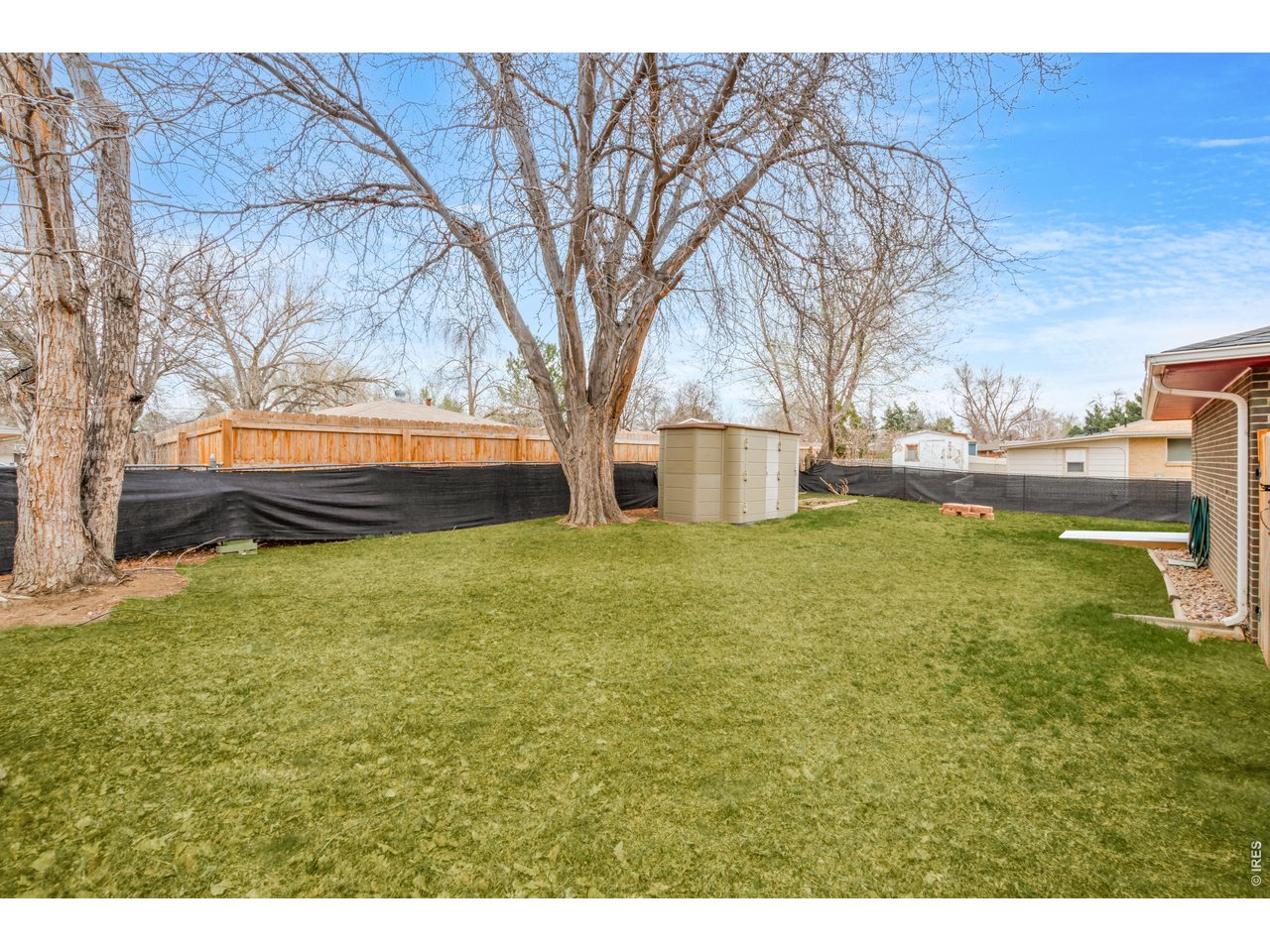 439 Dickson Street Longmont, CO 80504 - Photo 28 of 31 a house view with swimming pool in front of it