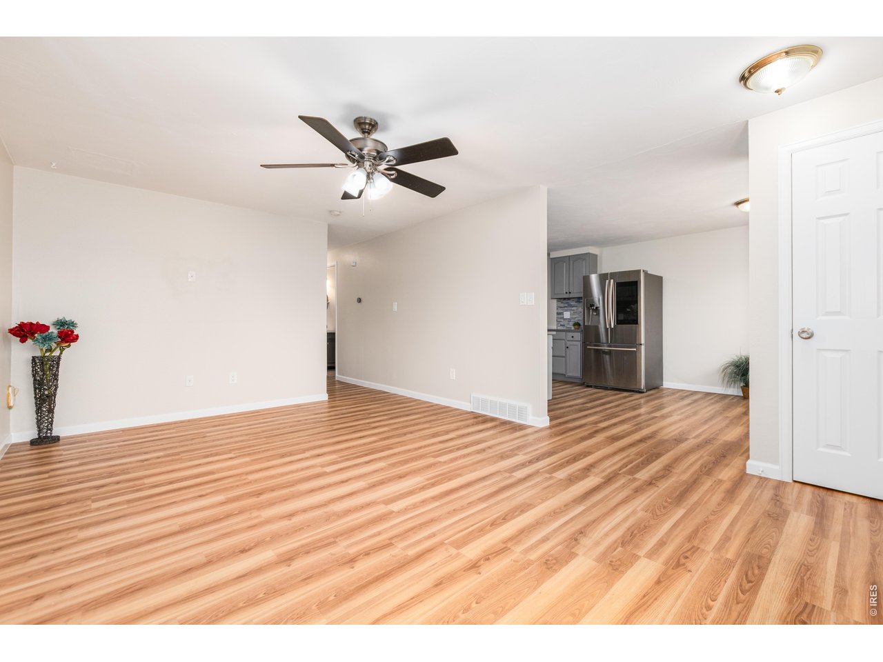 439 Dickson Street Longmont, CO 80504 - Photo 8 of 31 a view of empty room with wooden floor