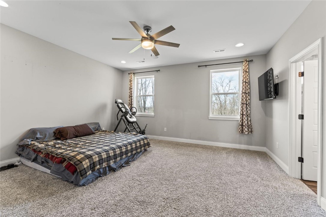 2425 Middleboro Road Clarksville, OH 45113 - Photo 62 of 91 This spacious bedroom offers ample comfort and natural light.