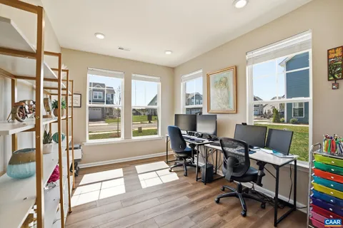 a workspace with furniture and a window