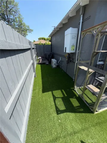 a view of backyard with cabin