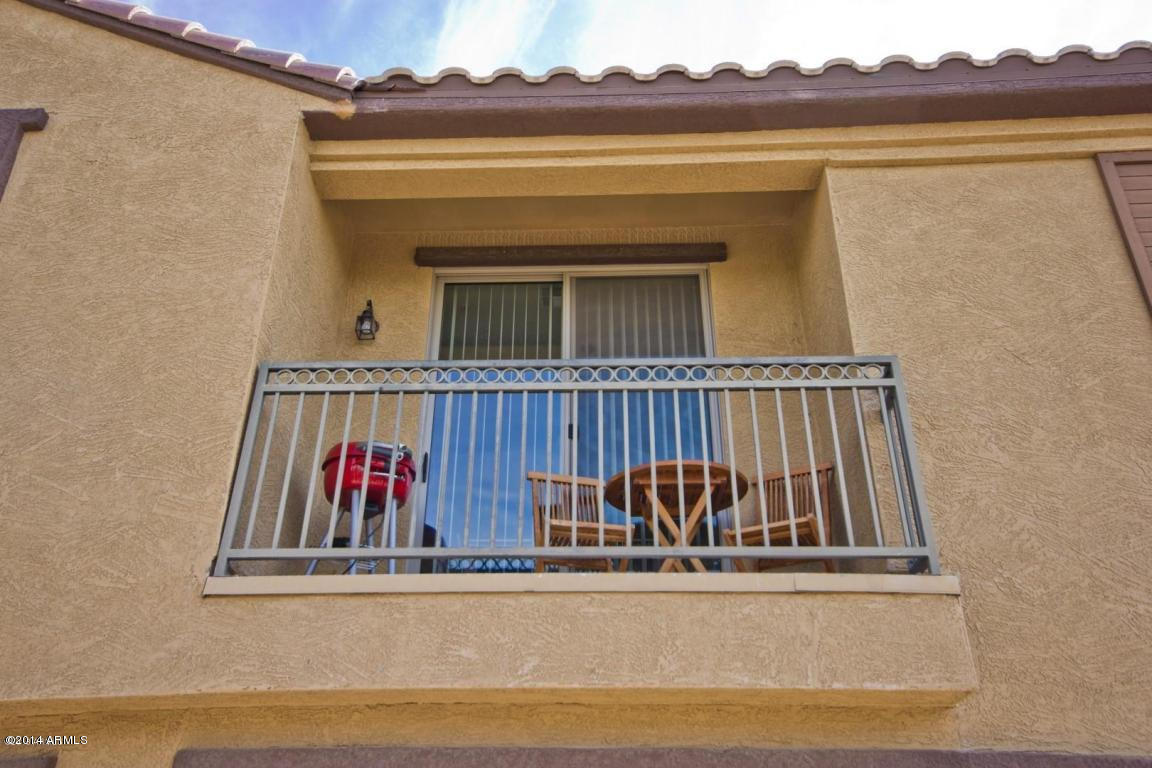 1250 South Rialto, Unit 62 Mesa, AZ 85209 - Photo 24 of 24 a view of a living room area with furniture and chandelier