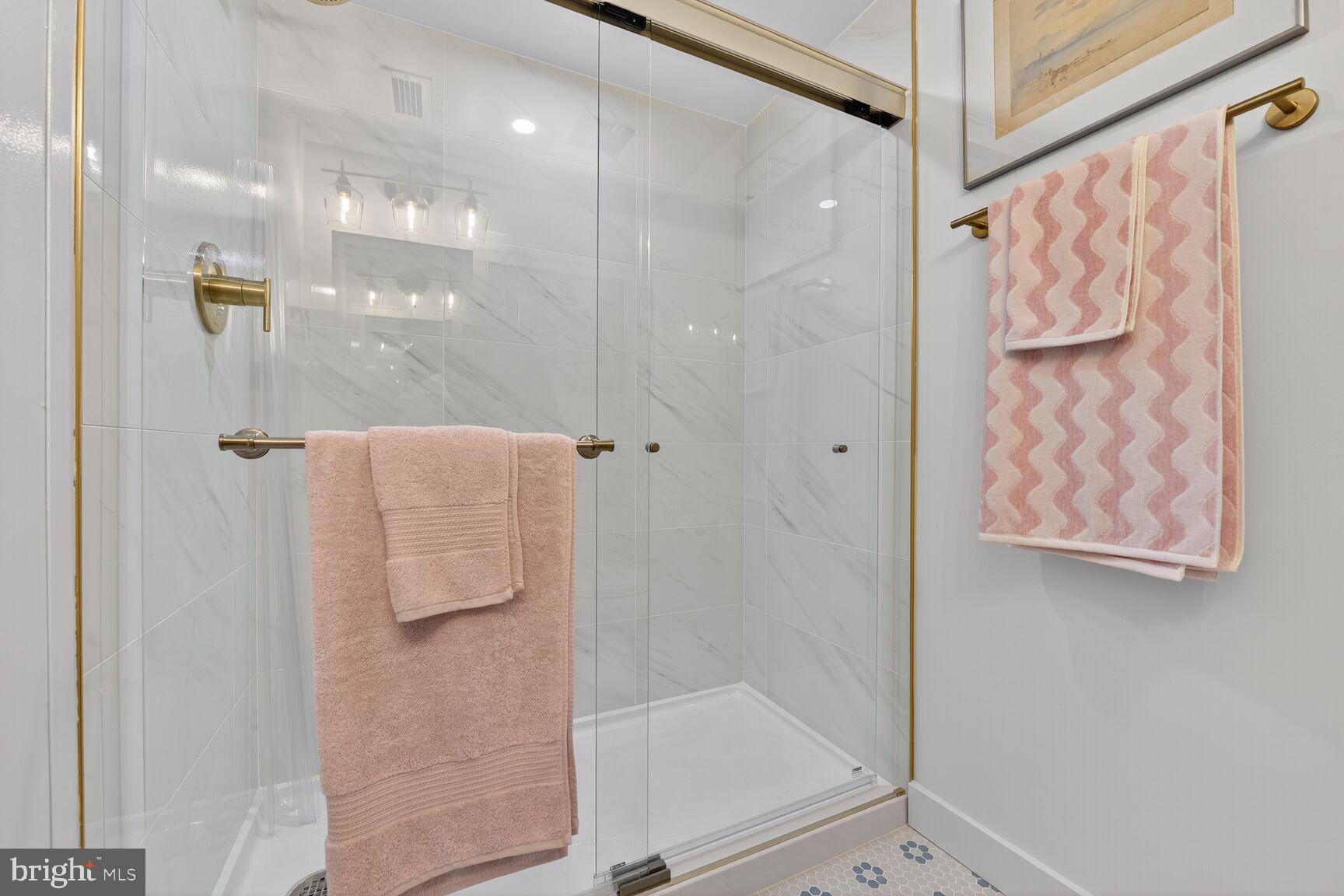 2208 Castle Rock Square, Unit 2B Reston, VA 20191 - Photo 20 of 51 a bathroom with a shower