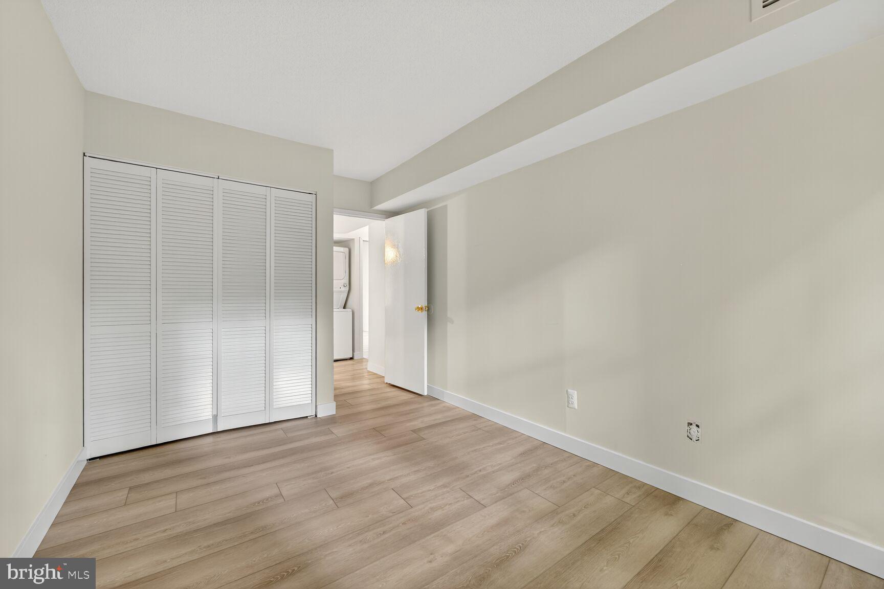2208 Castle Rock Square, Unit 2B Reston, VA 20191 - Photo 22 of 51 a view of an empty room