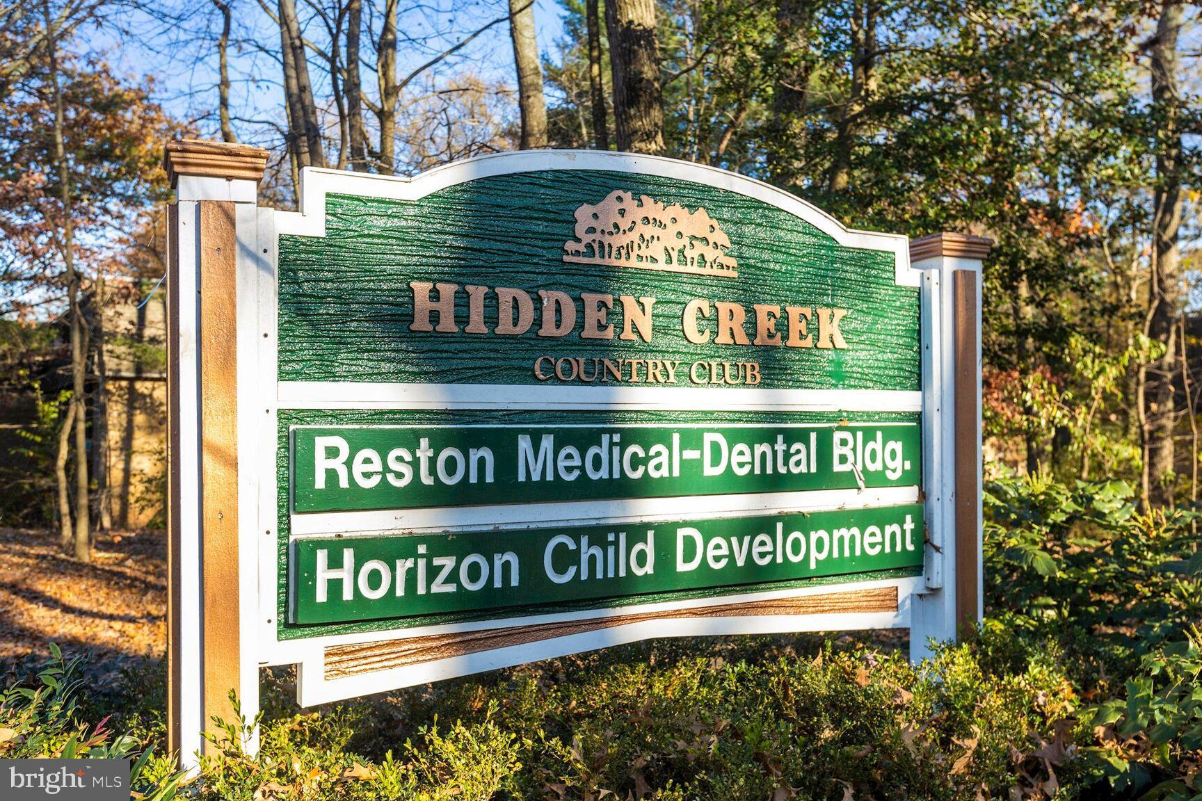 2208 Castle Rock Square, Unit 2B Reston, VA 20191 - Photo 41 of 51 a sign on the side of a building