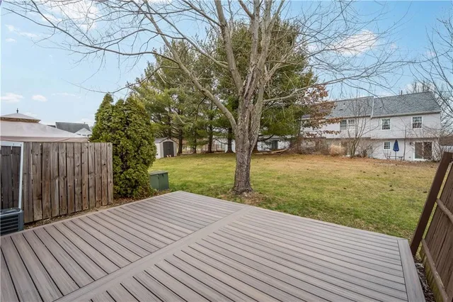 a view of a backyard with wooden floor