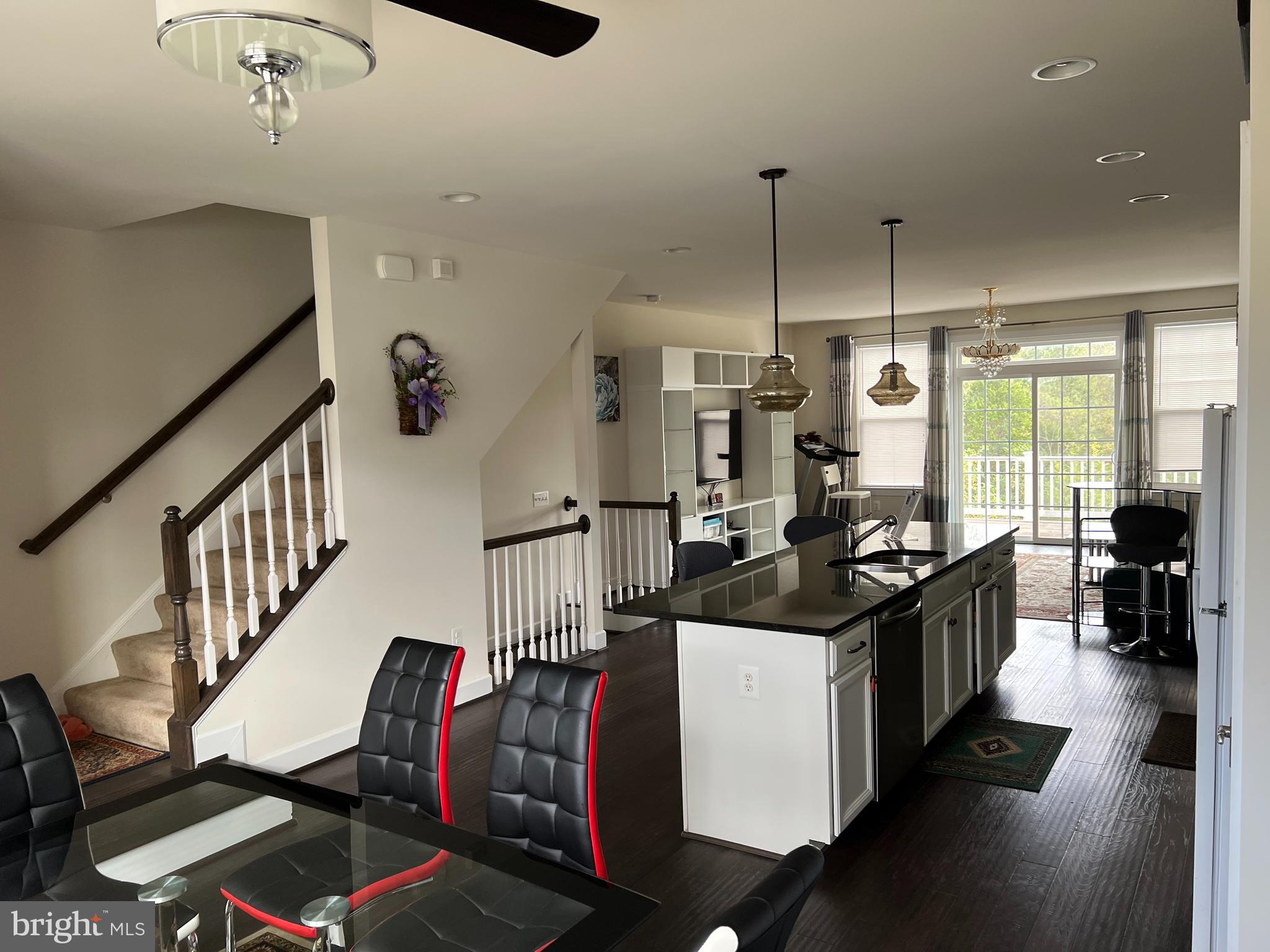 8429 Girvan Court Manassas, VA 20109 - Photo 14 of 31 a view of a living room and dining room