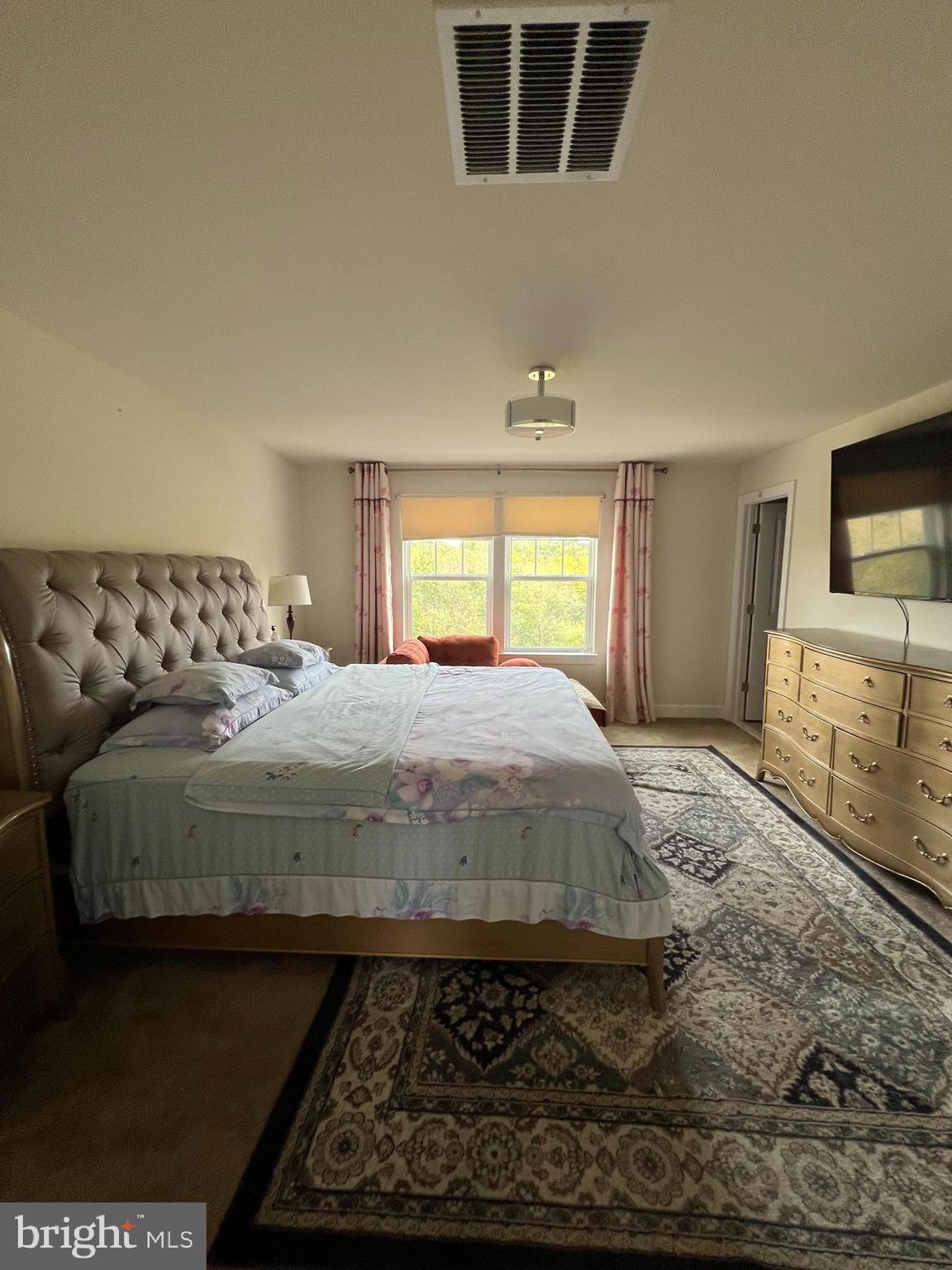 8429 Girvan Court Manassas, VA 20109 - Photo 24 of 31 a bedroom with a bed and window