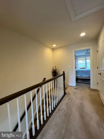 a view of hallway with stairs