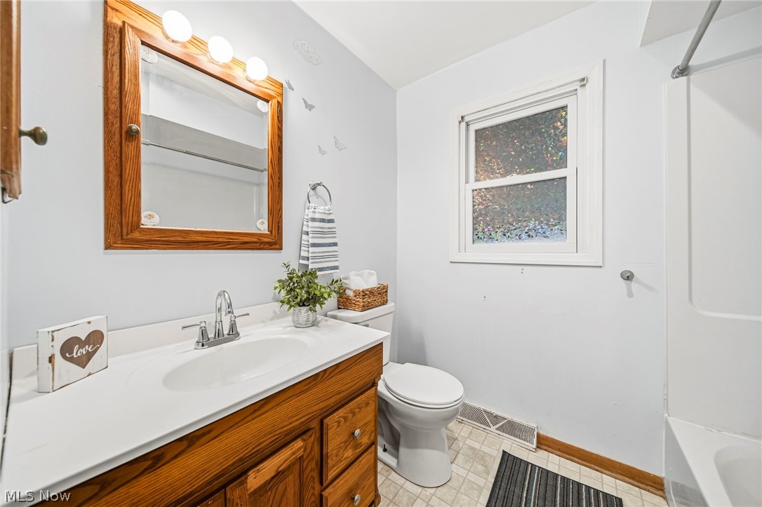 2535 Sears Road Stow, OH 44224 - Photo 18 of 34 Main floor Bathroom featuring vanity and toilet (new in 2022)