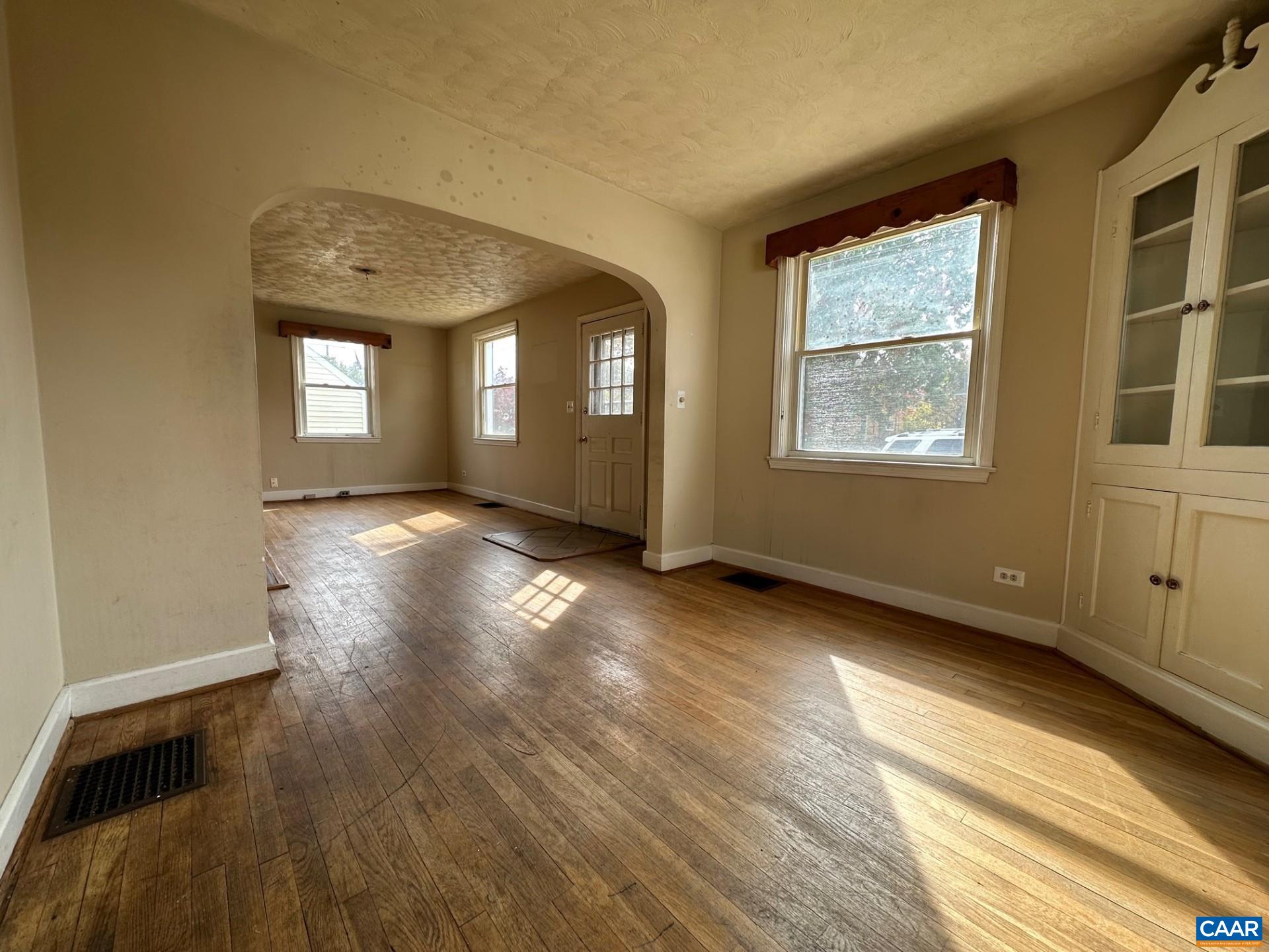 715 Elliott Avenue Charlottesville, VA 22902 - Photo 13 of 14 a view of an empty room with wooden floor and a window
