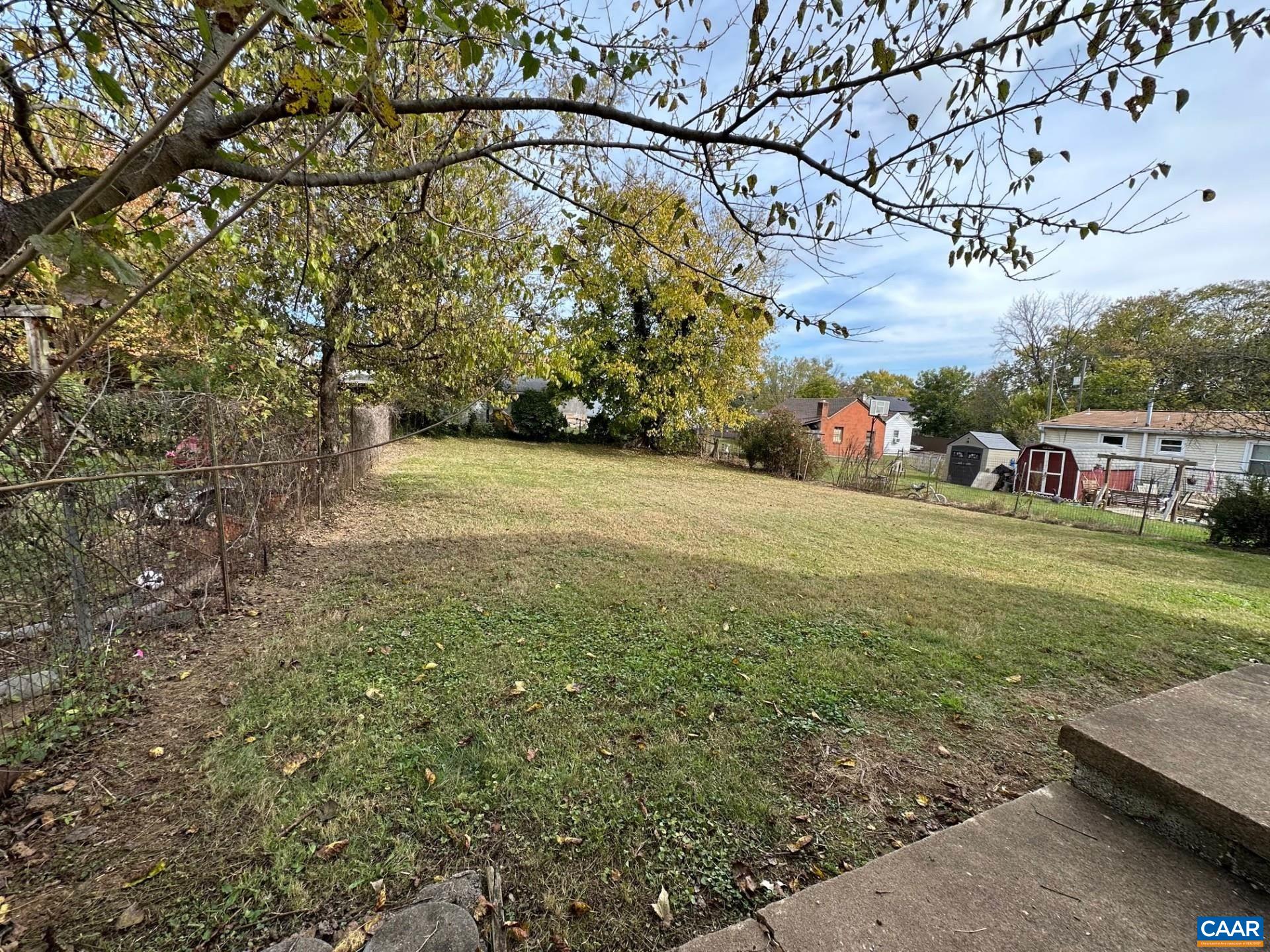 715 Elliott Avenue Charlottesville, VA 22902 - Photo 7 of 14 a view of a field with an trees