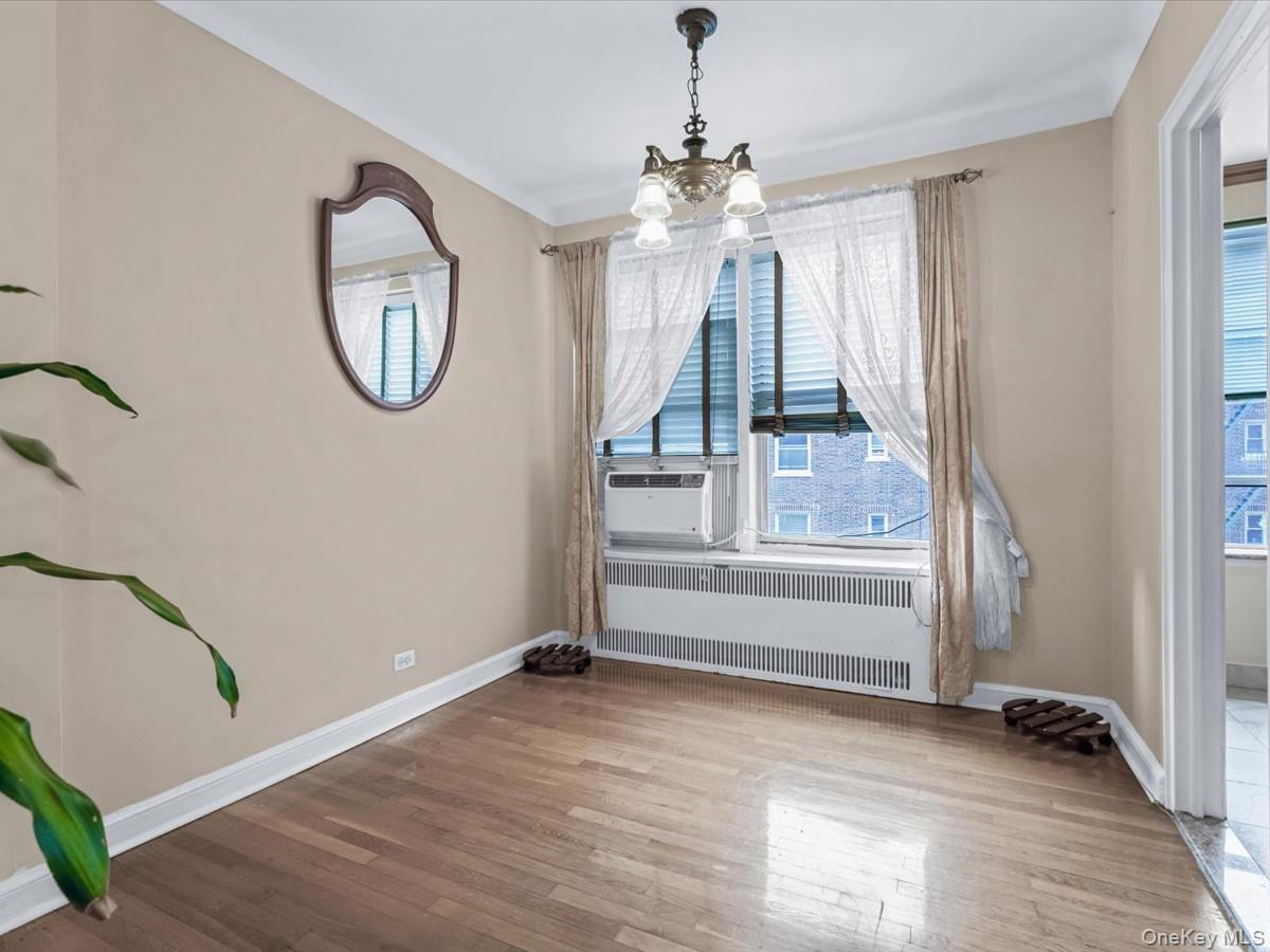 11034 73rd Road, Unit 4F Queens, NY 11375 - Photo 11 of 24 a view of an entryway with wooden floor