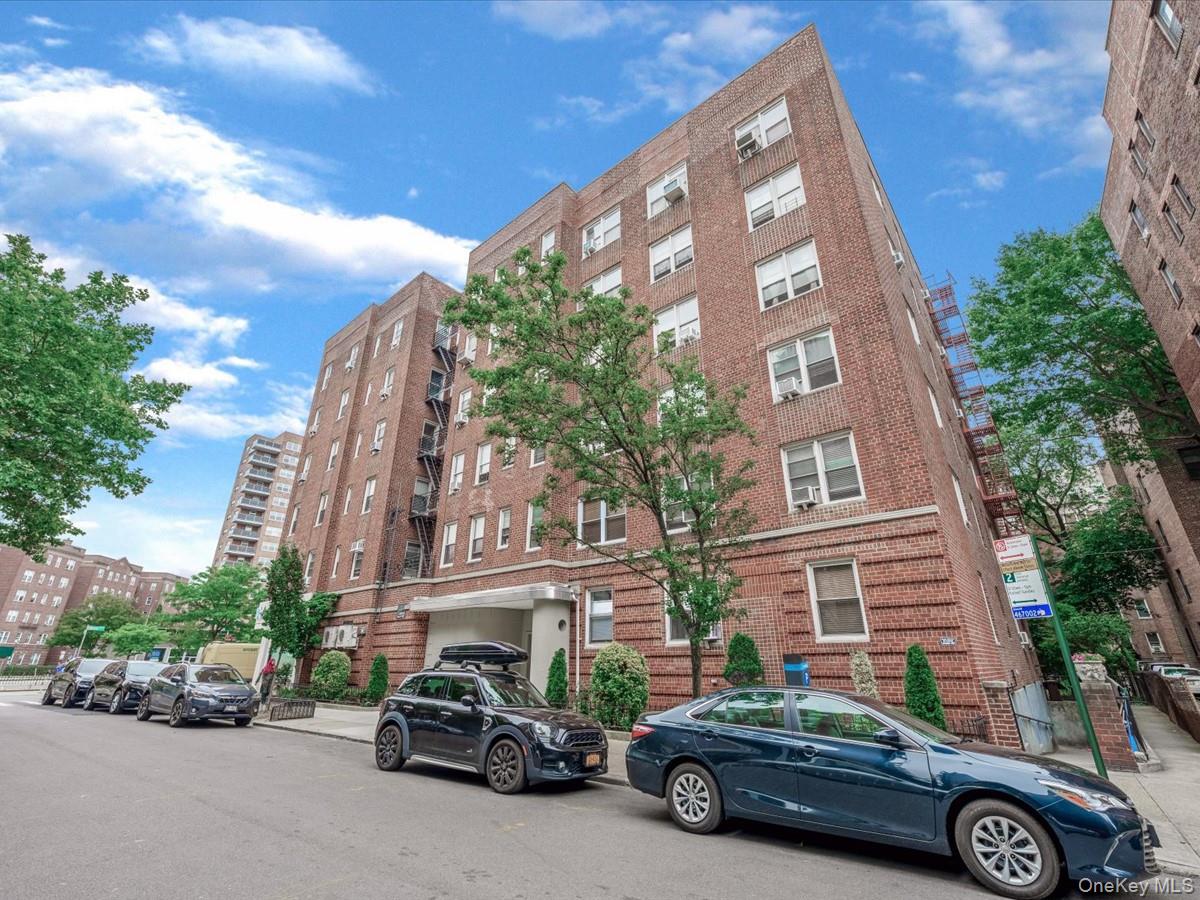 11034 73rd Road, Unit 4F Queens, NY 11375 - Photo 2 of 24 a car parked in front of a building