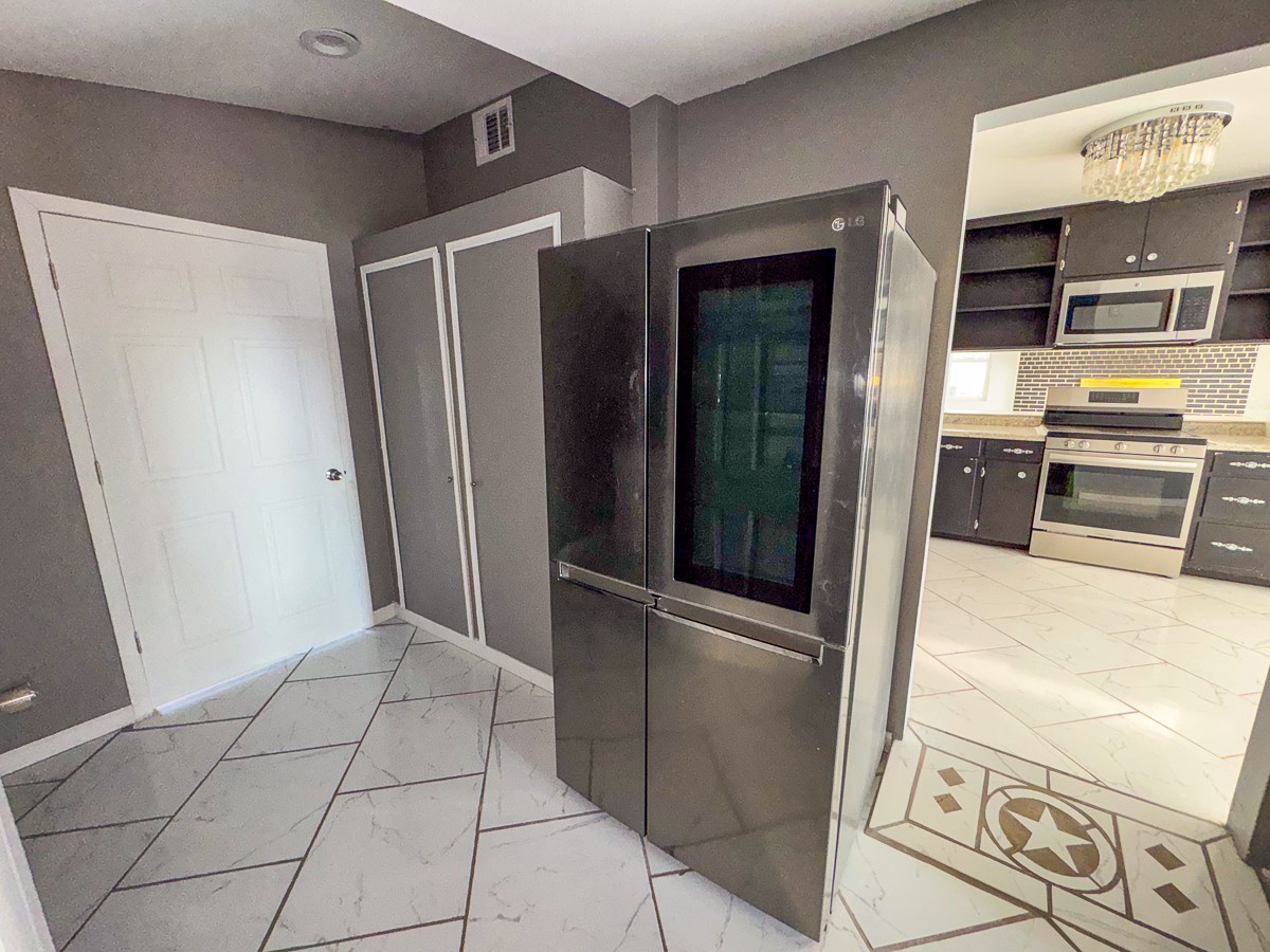 1 Fm 328 Huntington, TX 75949 - Photo 27 of 40 a kitchen with stainless steel appliances granite countertop a refrigerator and a stove